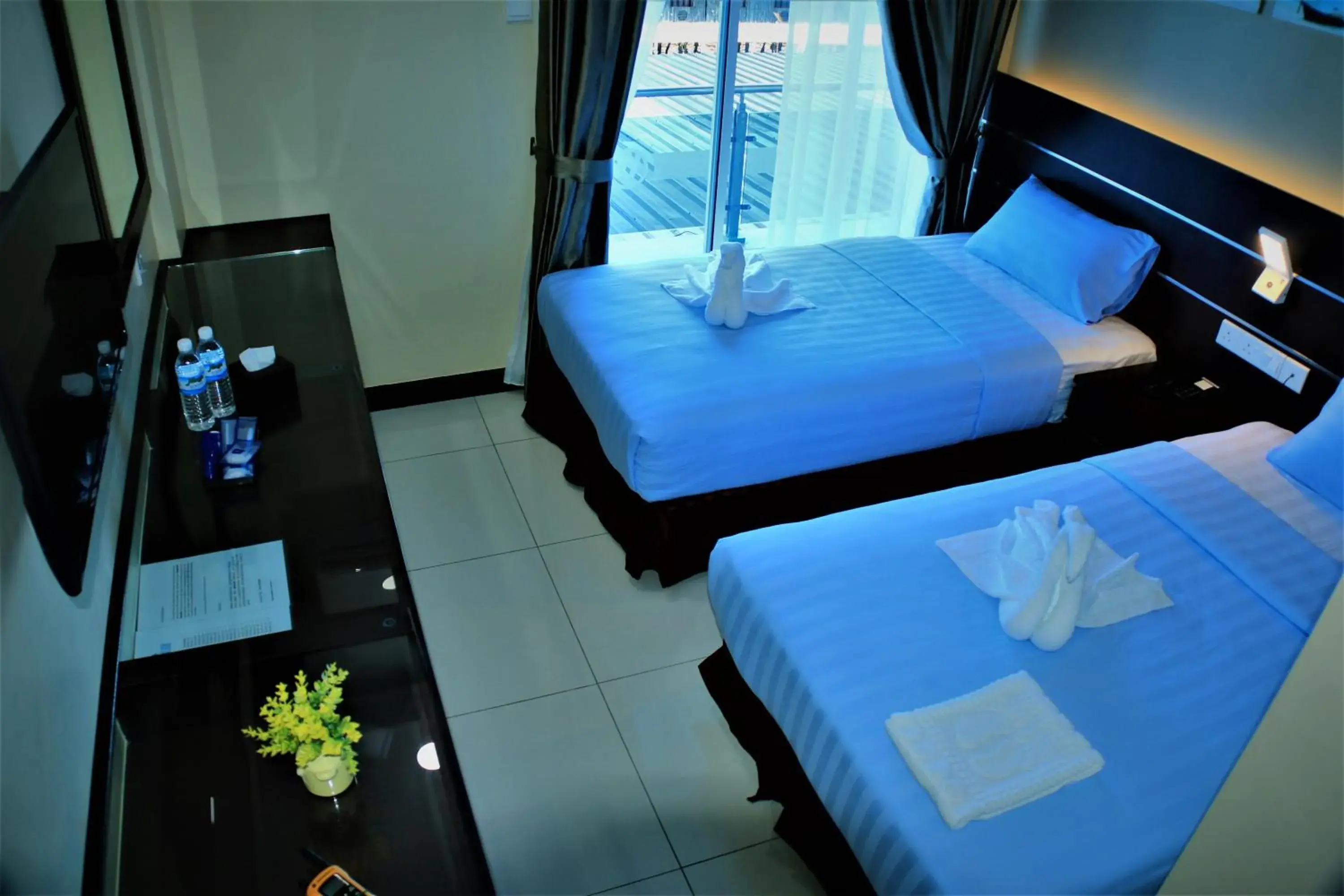 Bed in Wave View Hotel