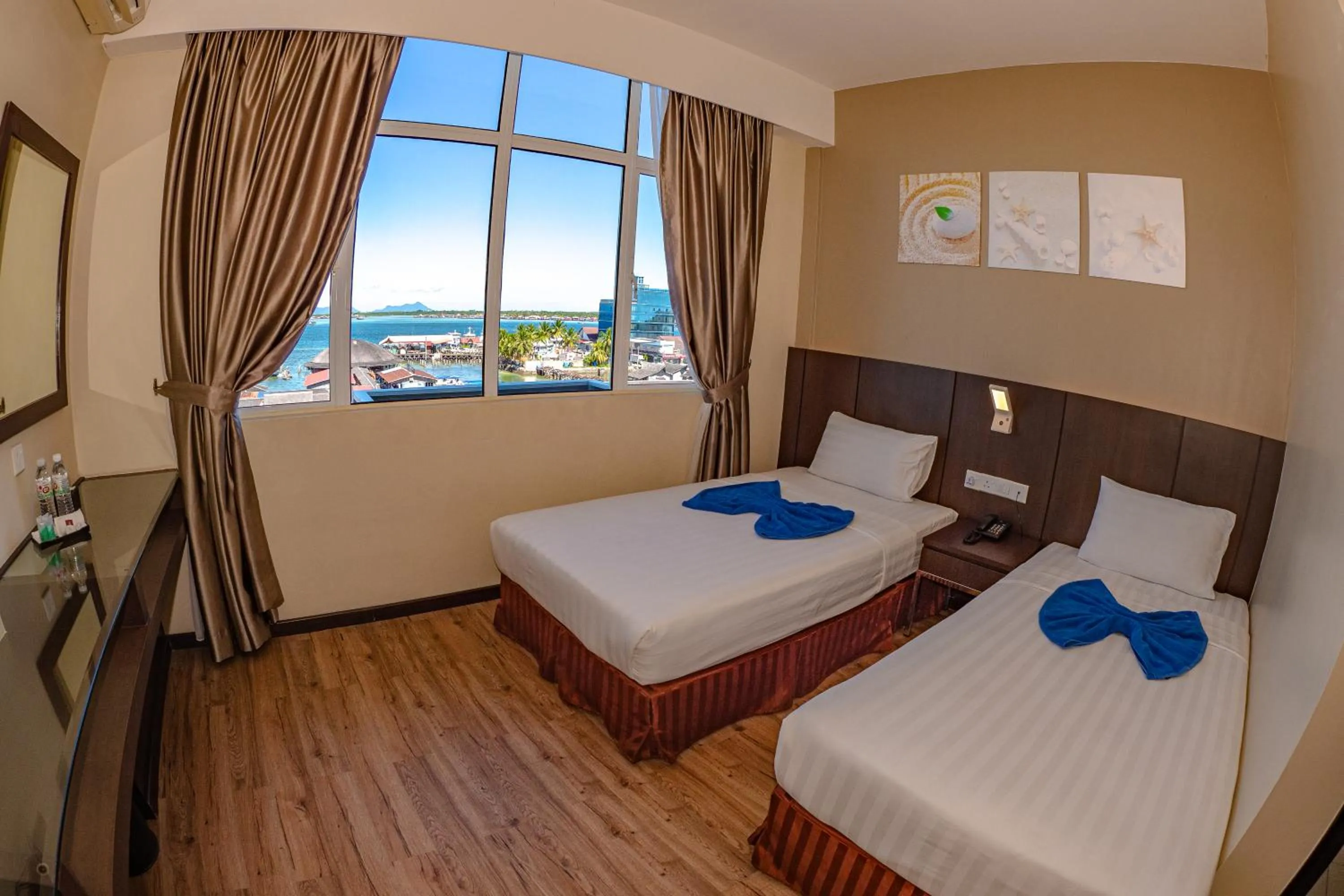 Bed in Wave View Hotel