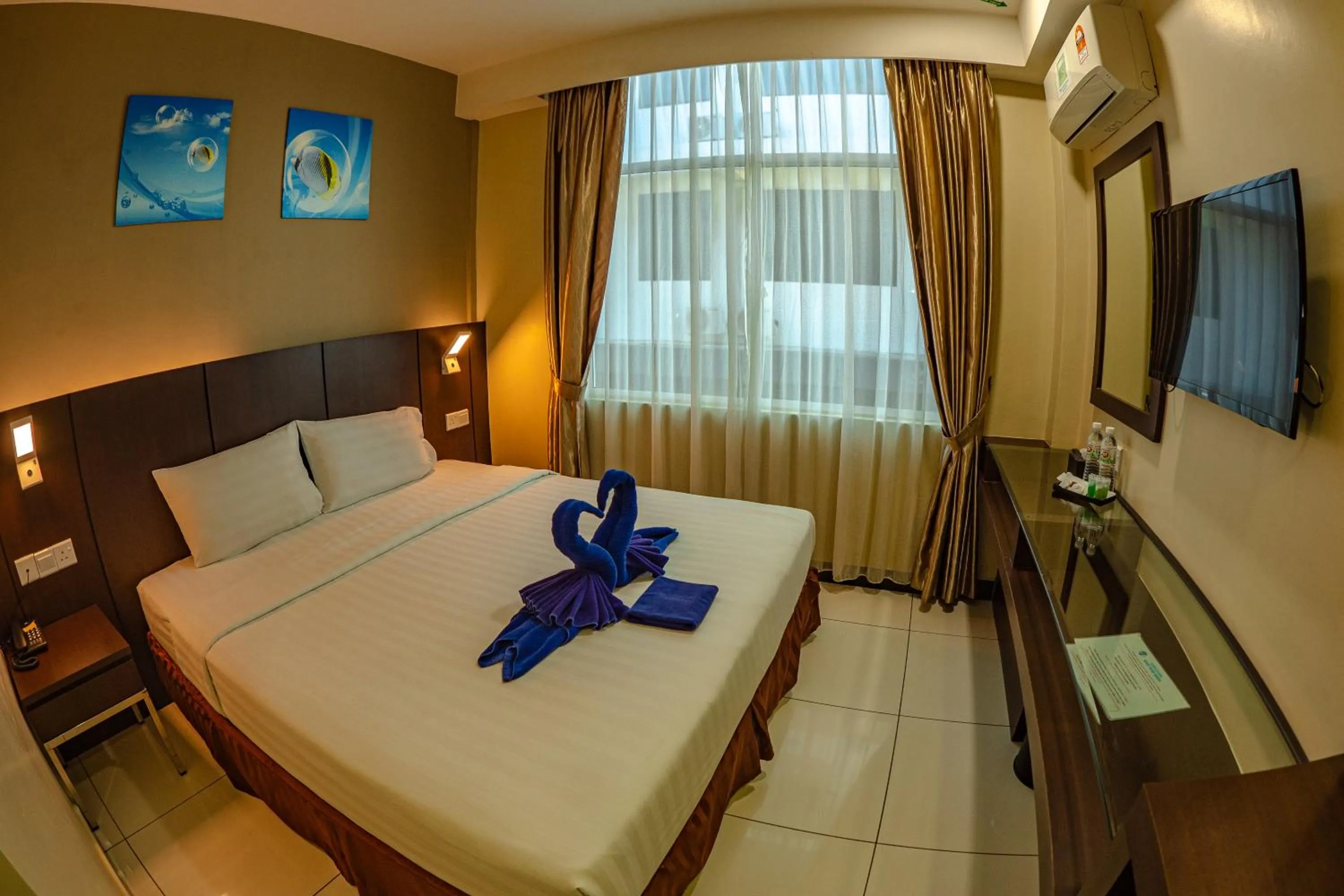 Bed in Wave View Hotel