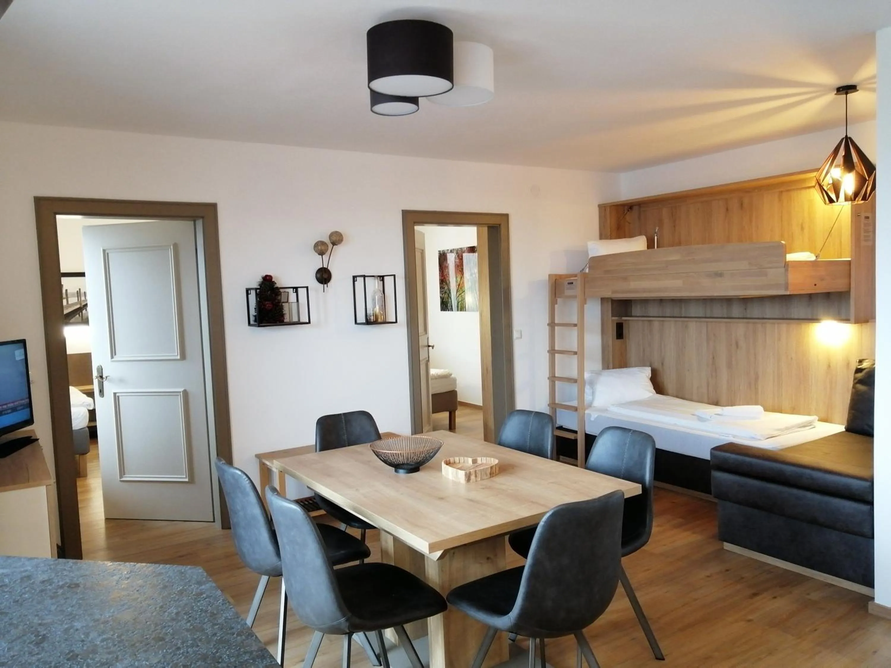 Living room, Bed in Alm Appartements ZellamSee