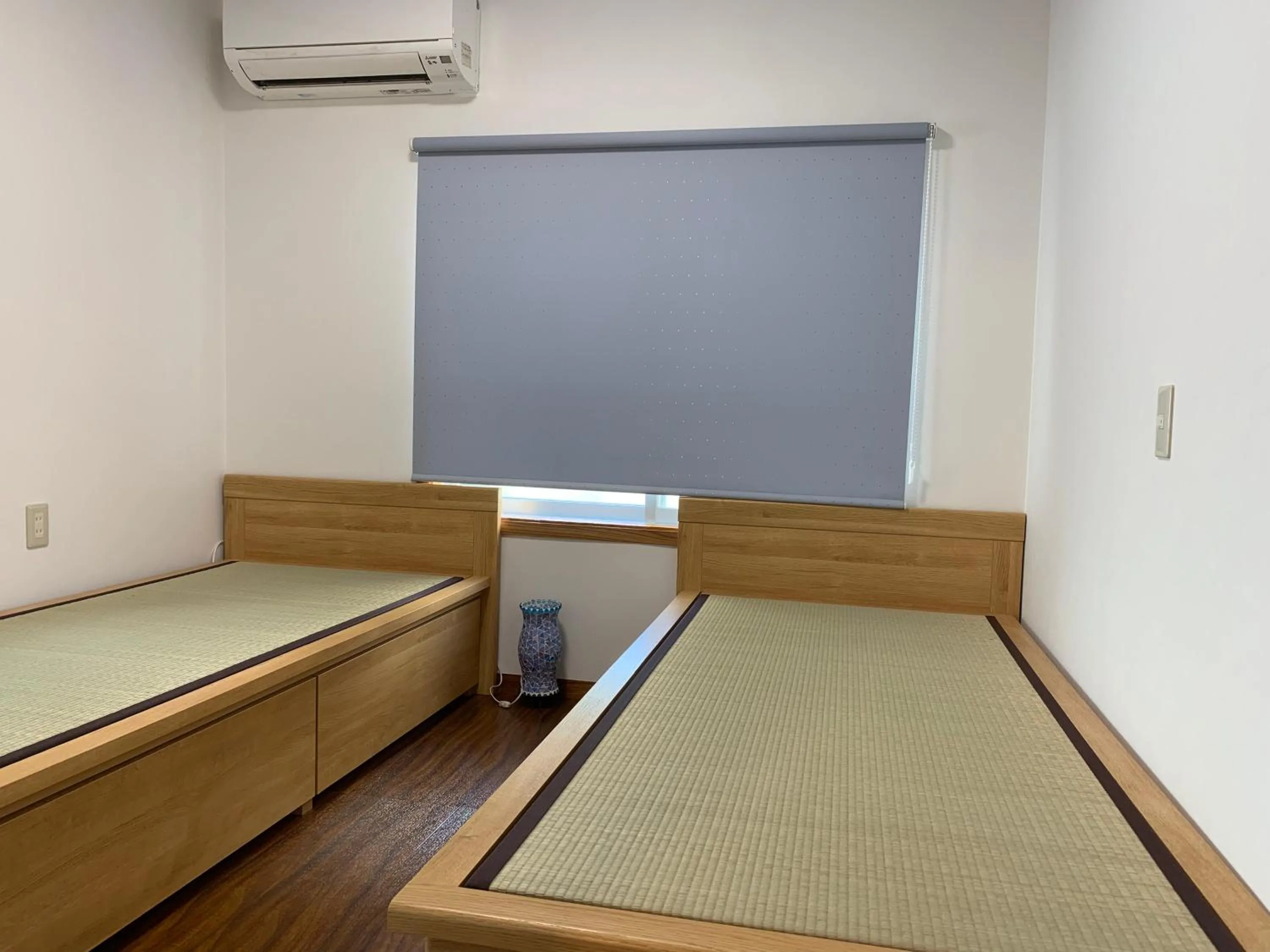 Bed in Condominium WAFU TEI Okinawa city