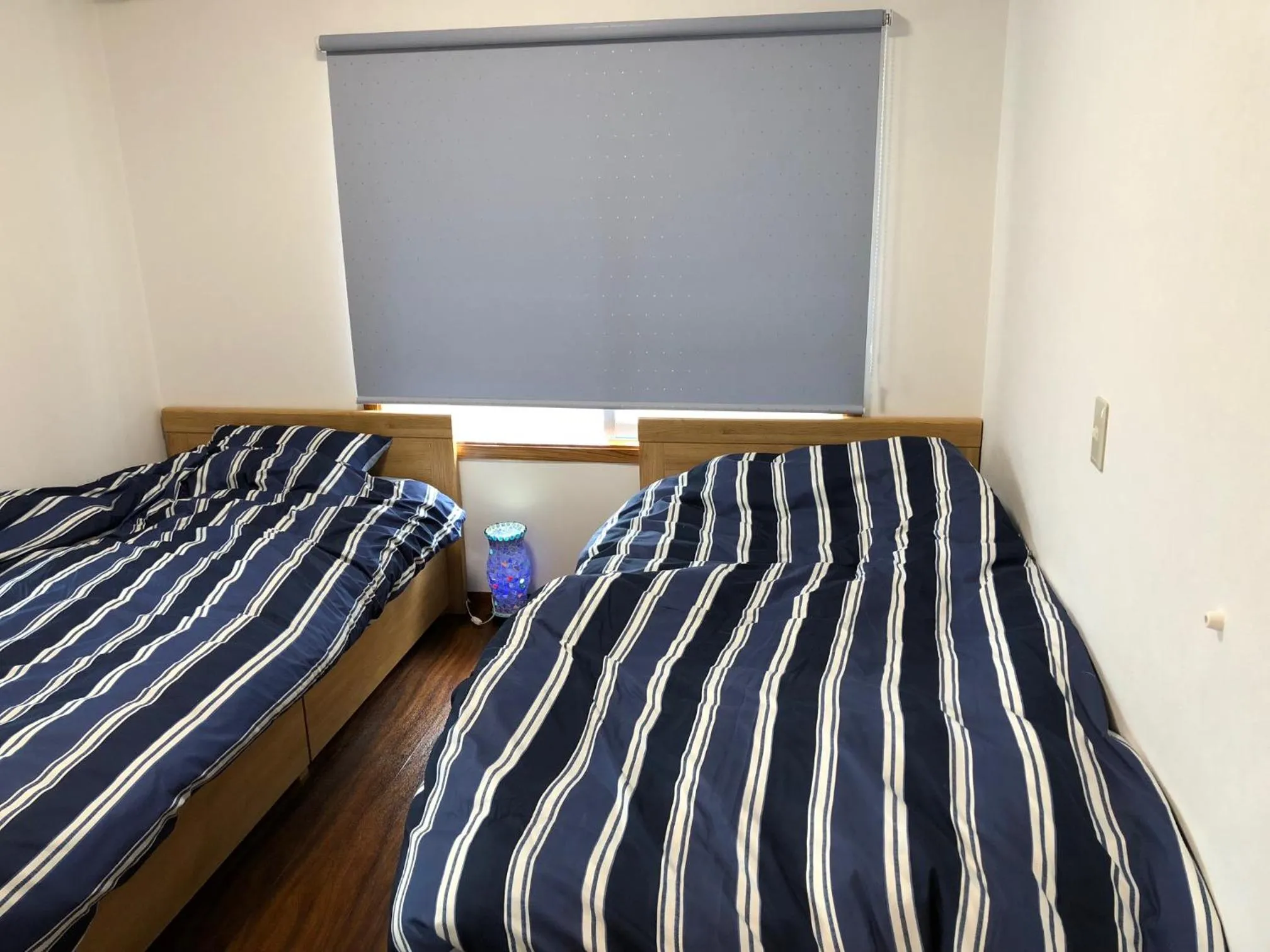 Bed in Condominium WAFU TEI Okinawa city