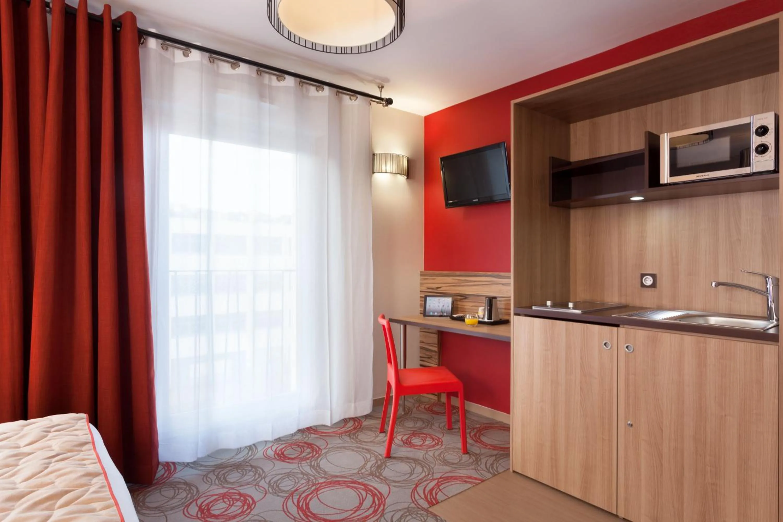 Photo of the whole room in Aparthotel Adagio Lyon Patio Confluence