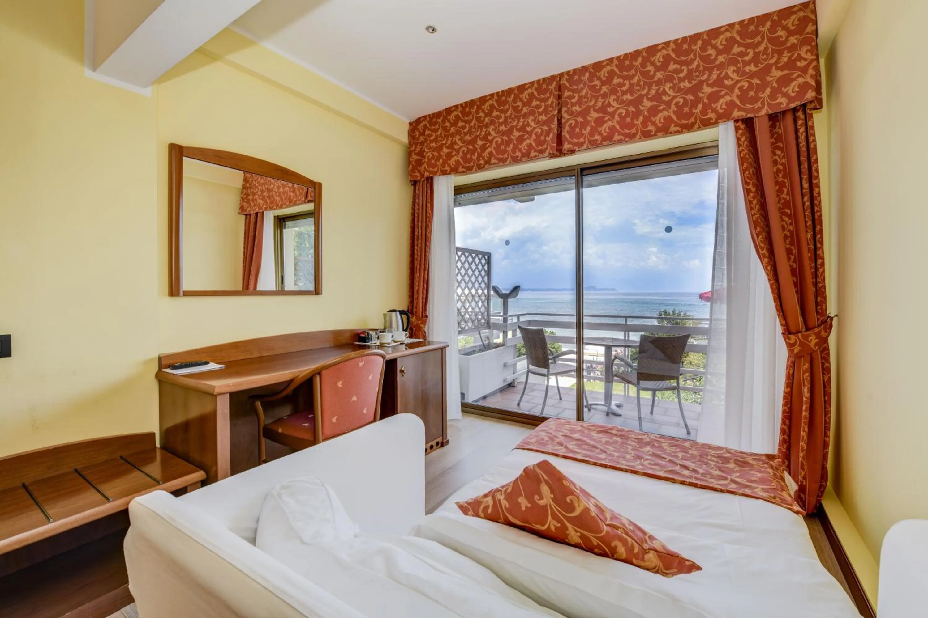 Photo of the whole room, Bed in Lido International