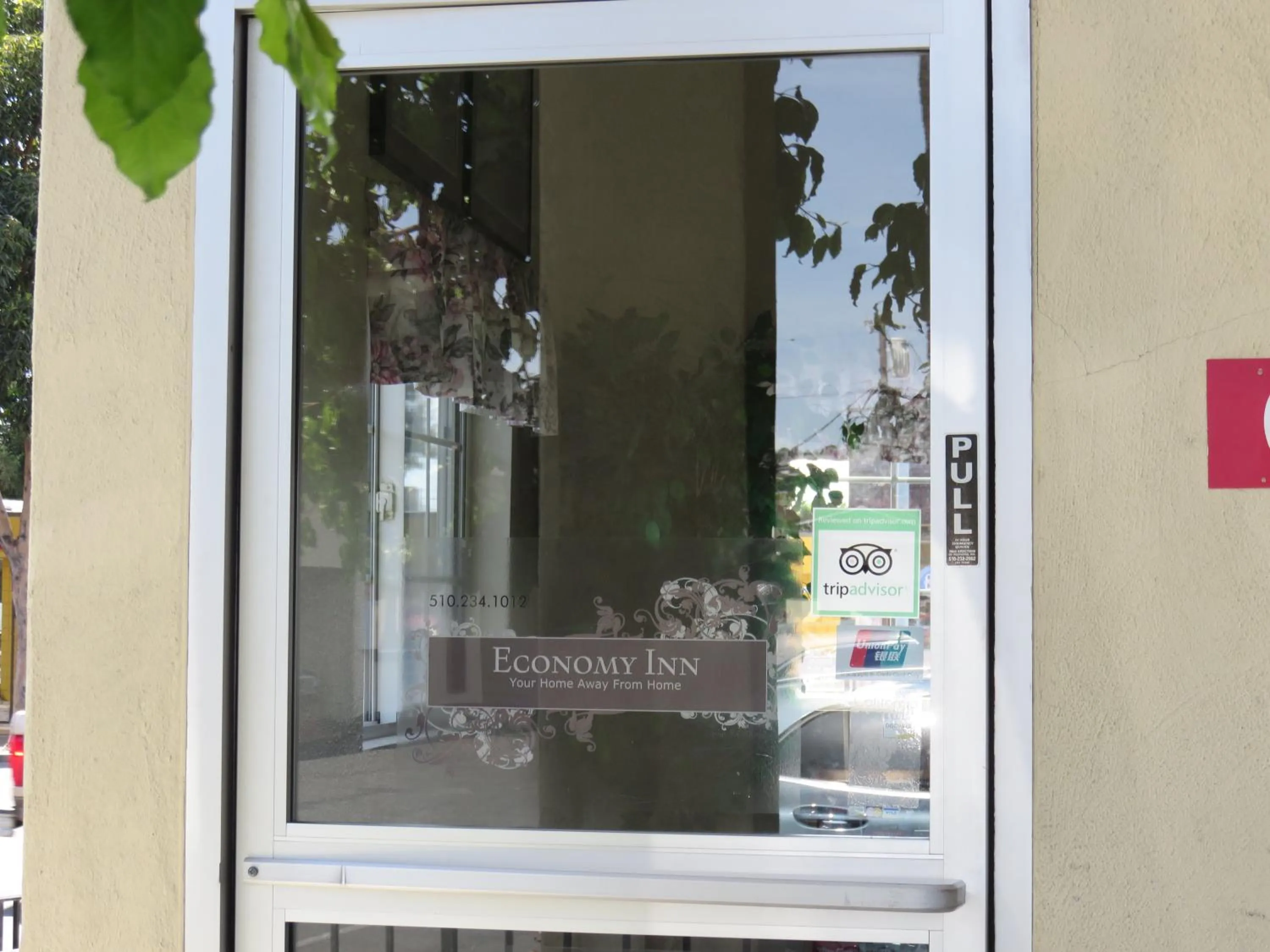 Property logo or sign in Economy Inn Richmond