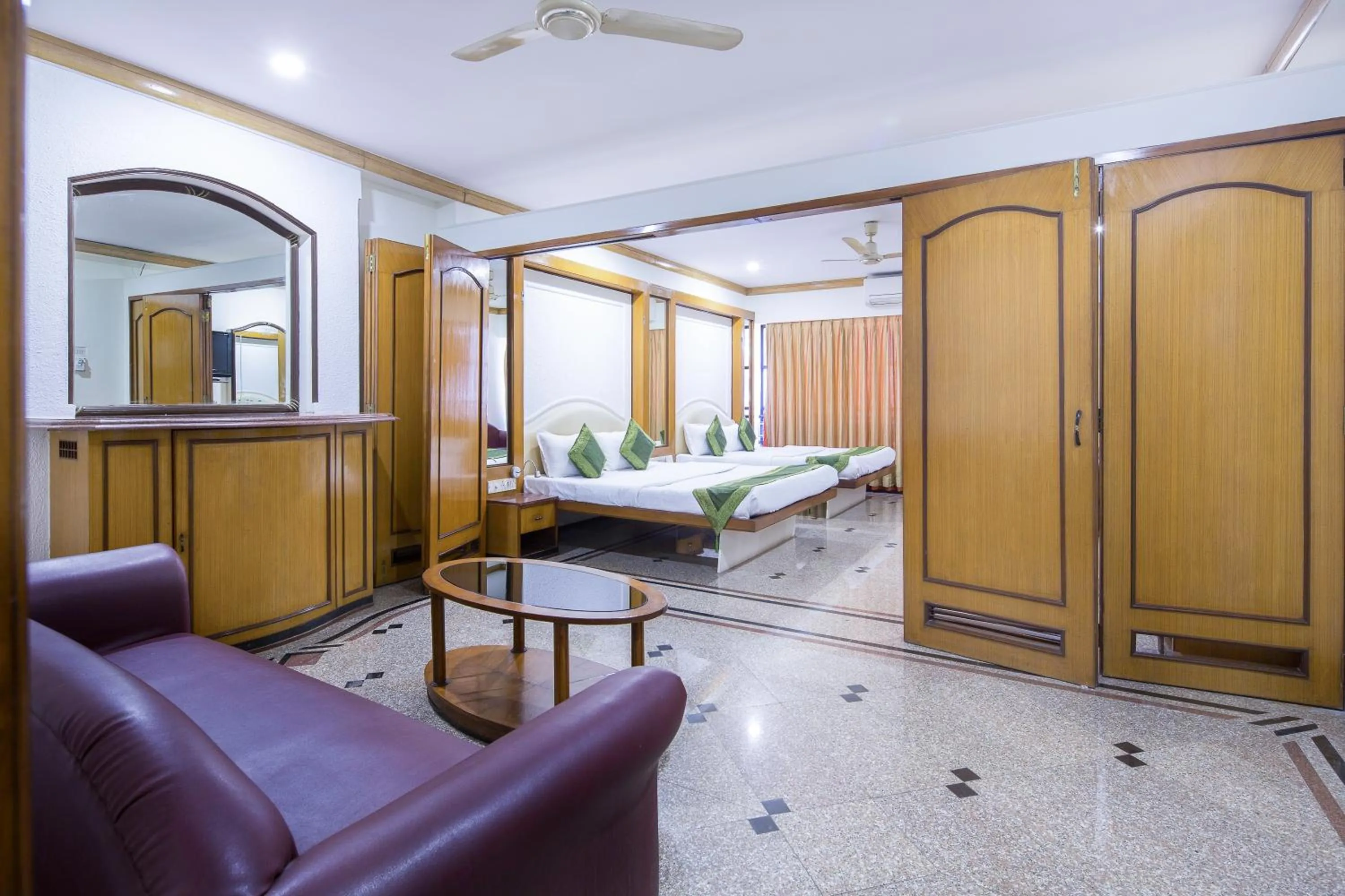 Seating area, Bed in Garden Hotel