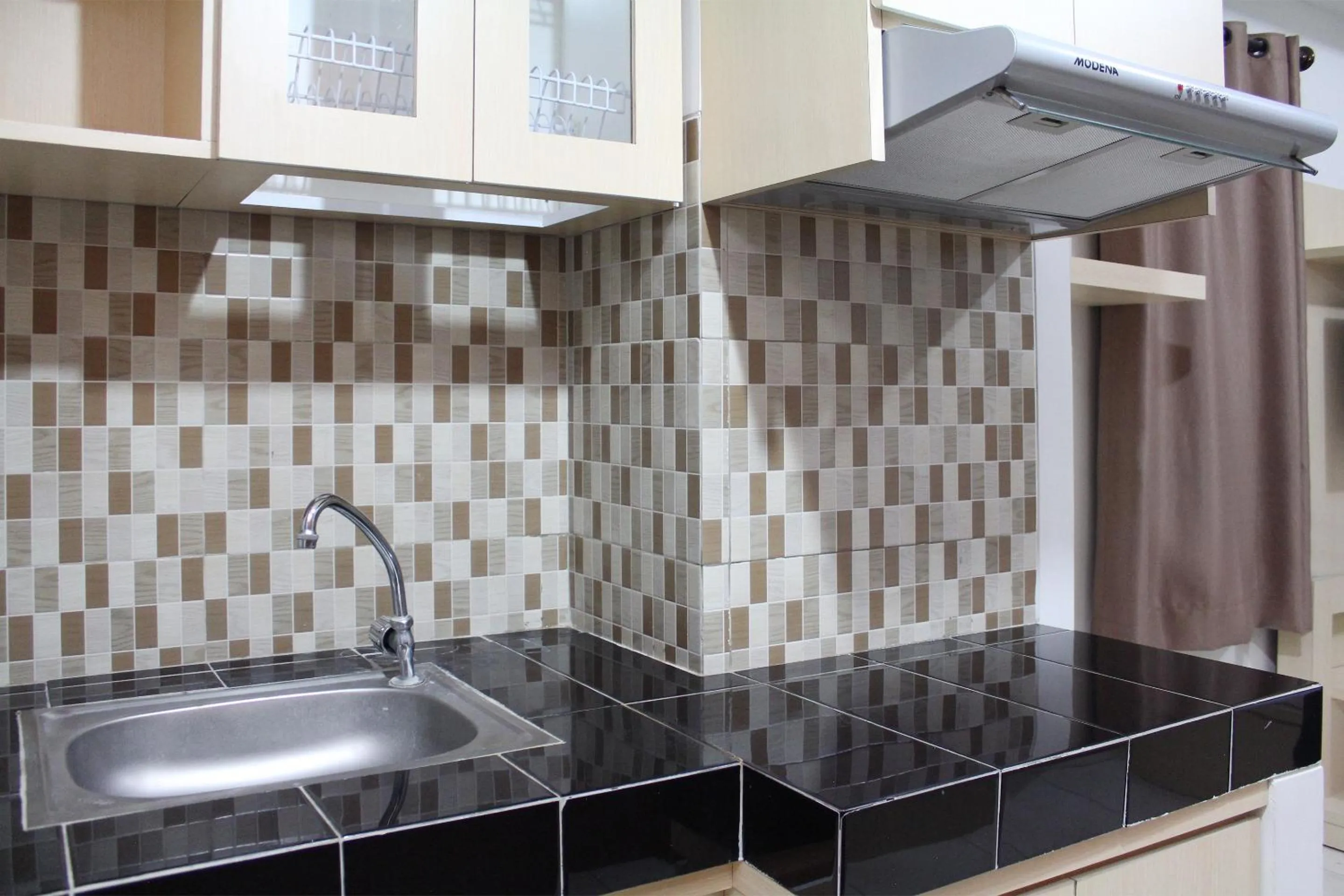 Kitchen or kitchenette, Kitchen/Kitchenette in OYO 266 Margonda Residence 5