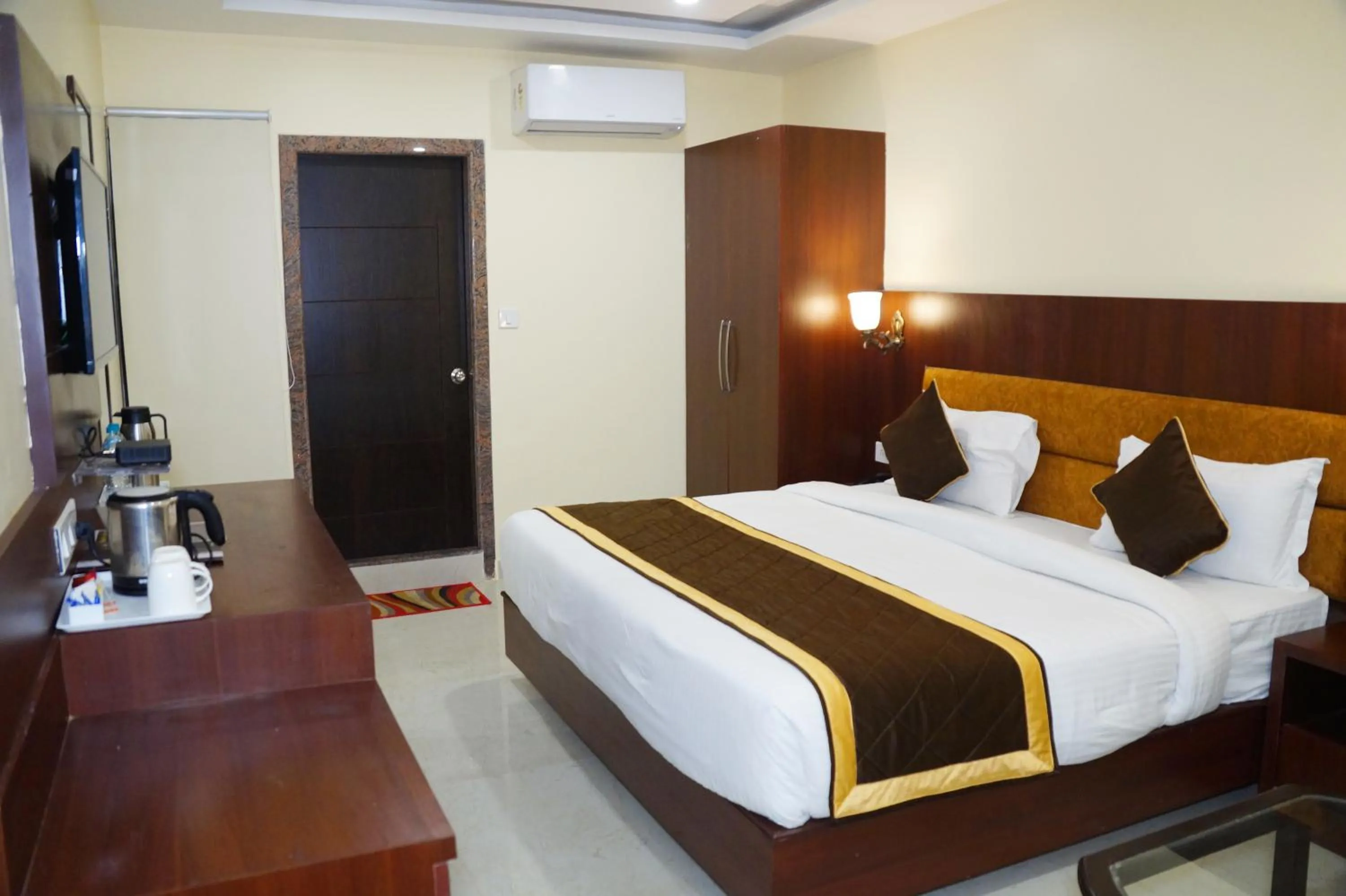 Bed in HOTEL SHIVOY GRAND