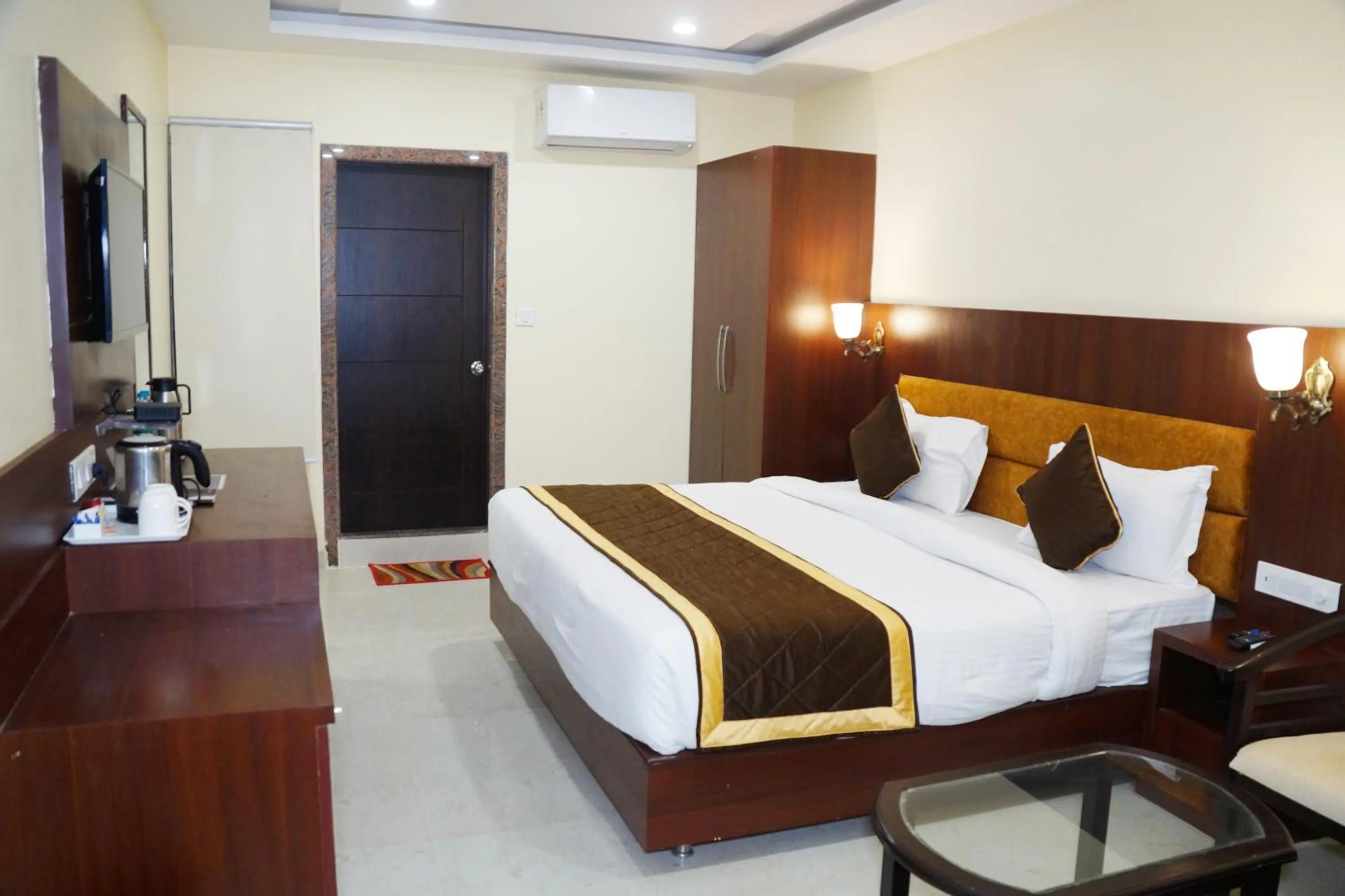 Bed in HOTEL SHIVOY GRAND