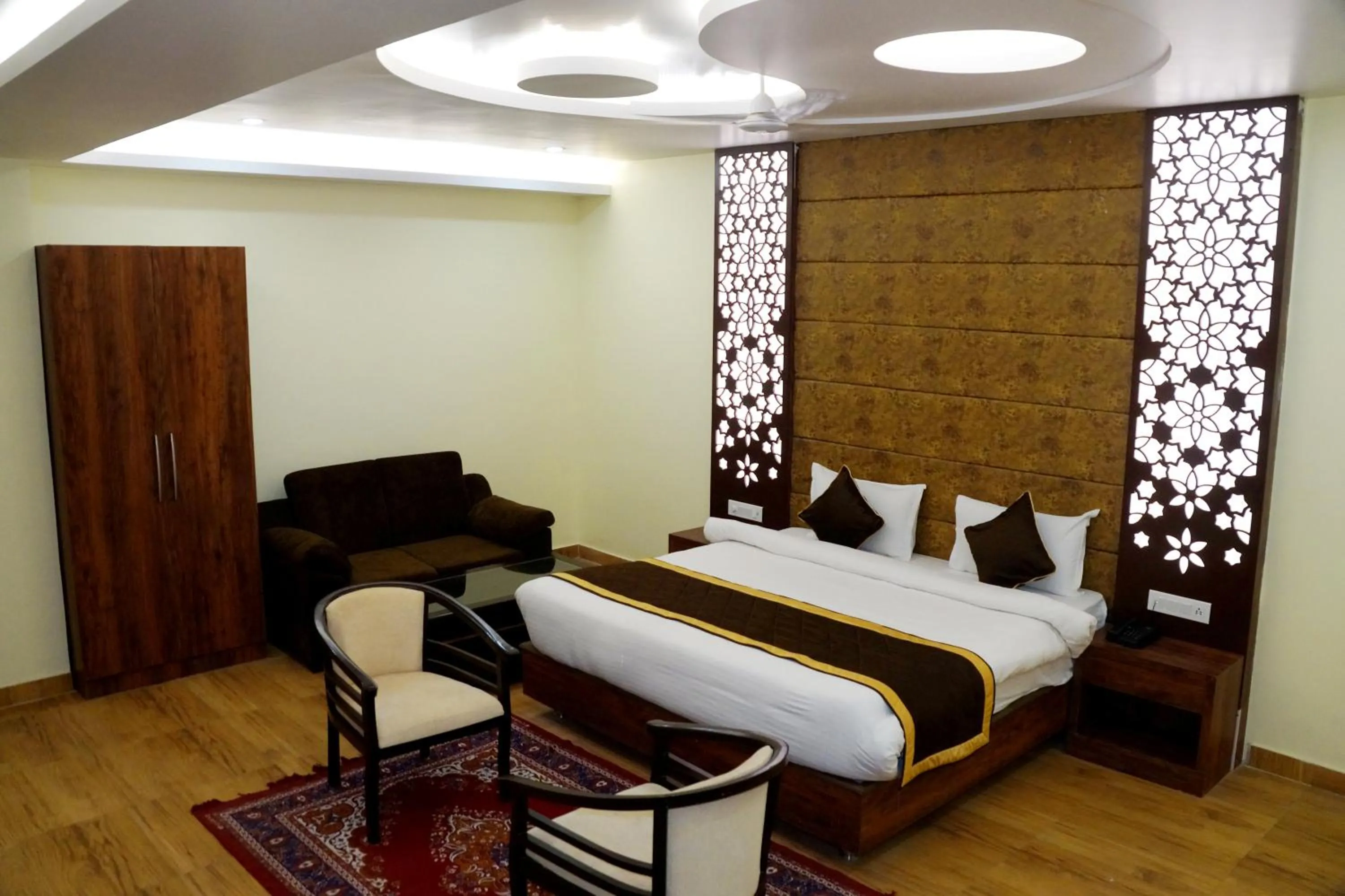 Bed in HOTEL SHIVOY GRAND