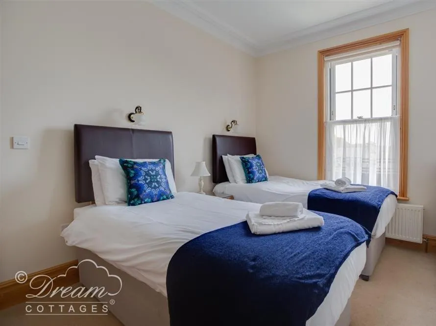 Bed in Beach View Apartment 3