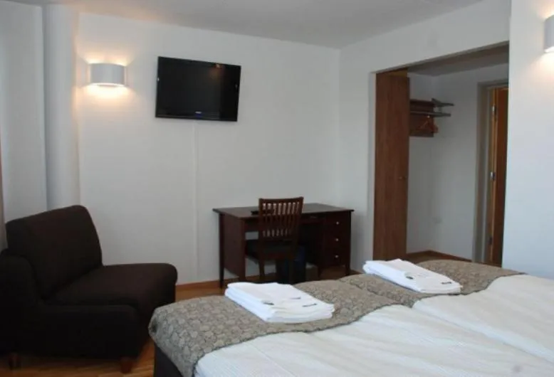 Bed in Hotel Alvariini