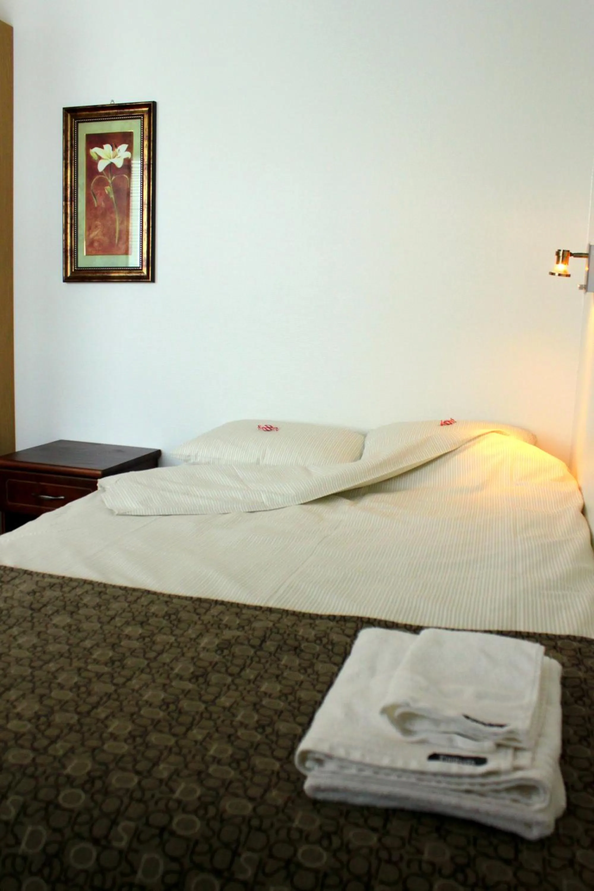 Bed in Hotel Alvariini