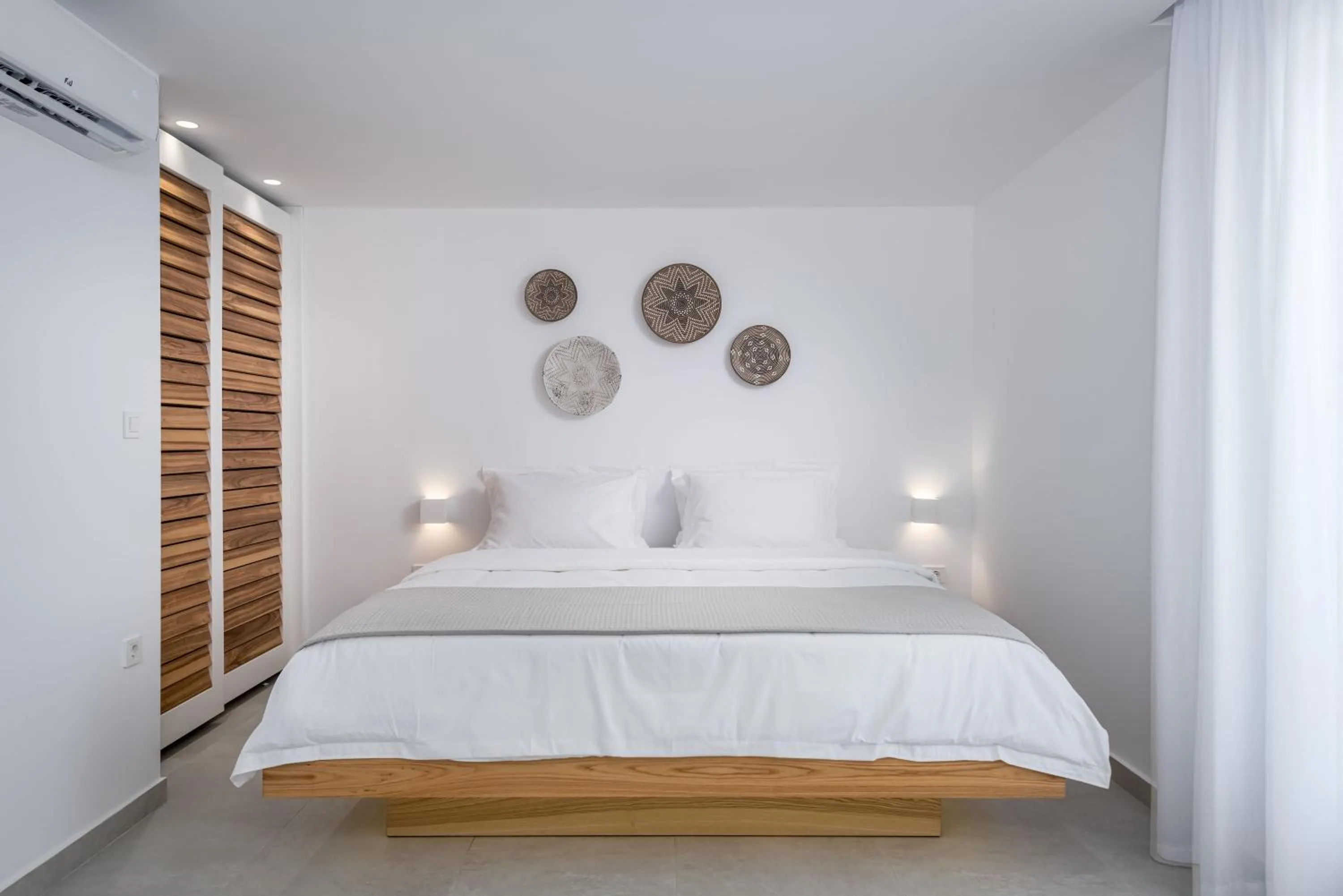 Bed in Kantouni Beach Boutique Hotel