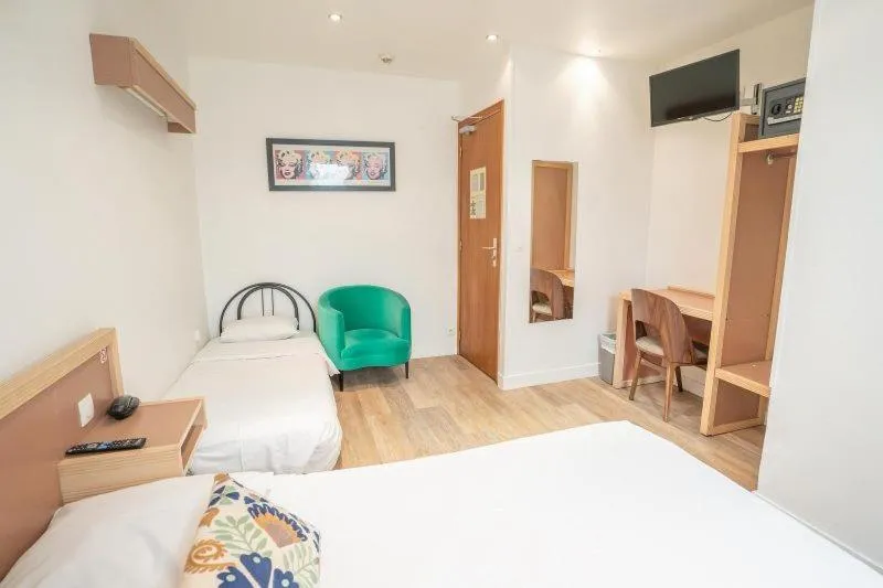 Bed in Hôtel Edgar Quinet