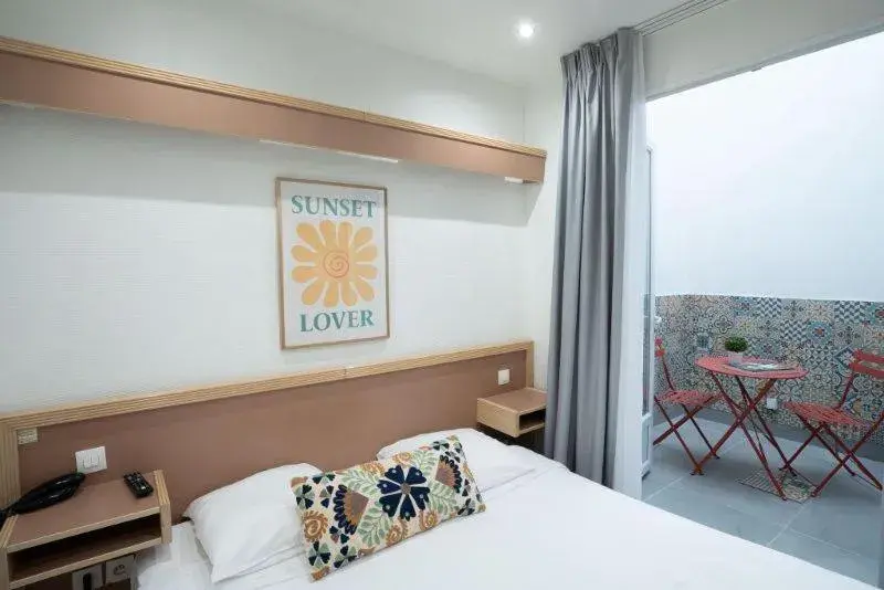 Bed in Hôtel Edgar Quinet Bed in Hôtel Edgar Quinet