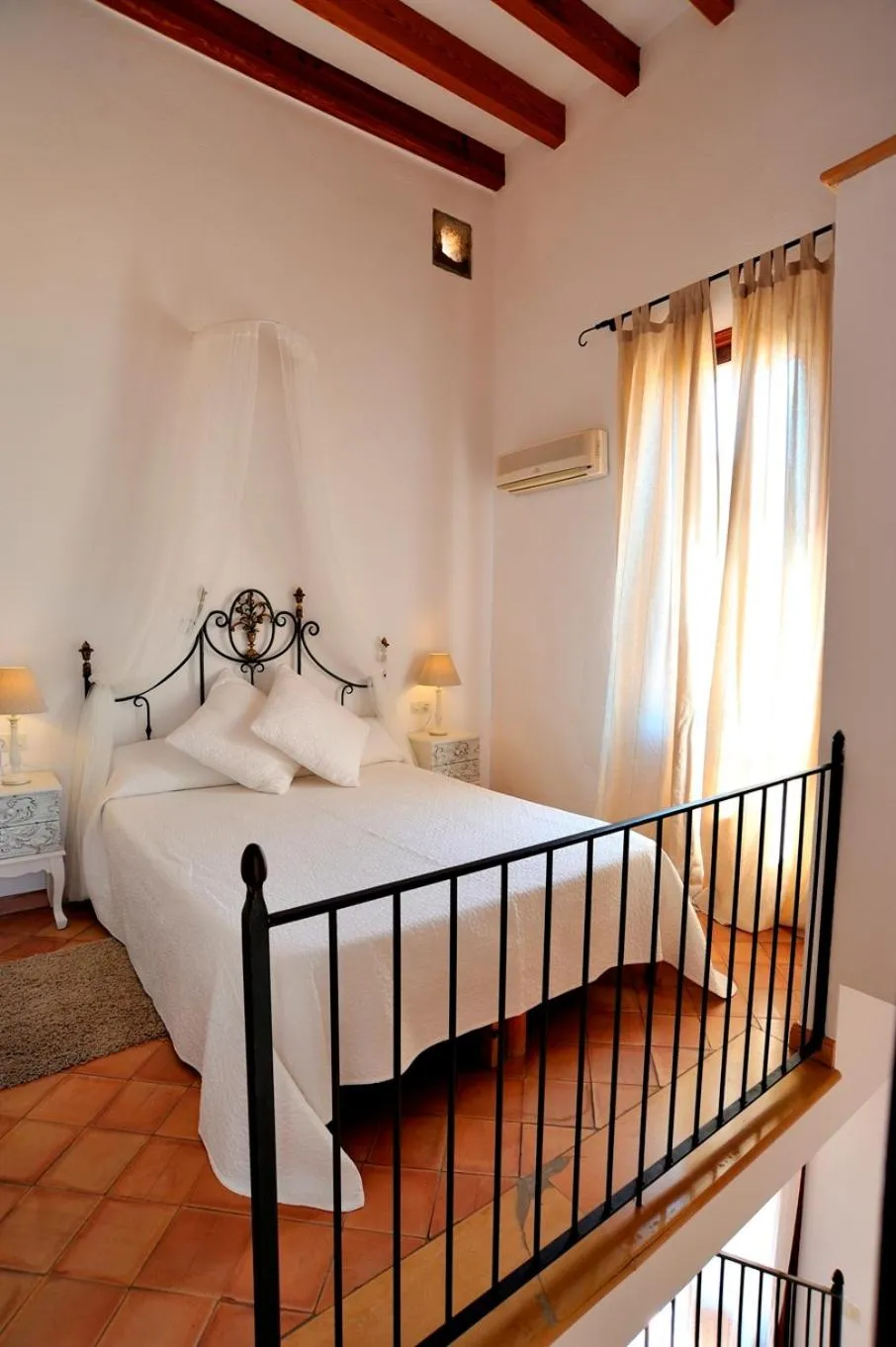 Bed in Petit Hotel Es Figueral