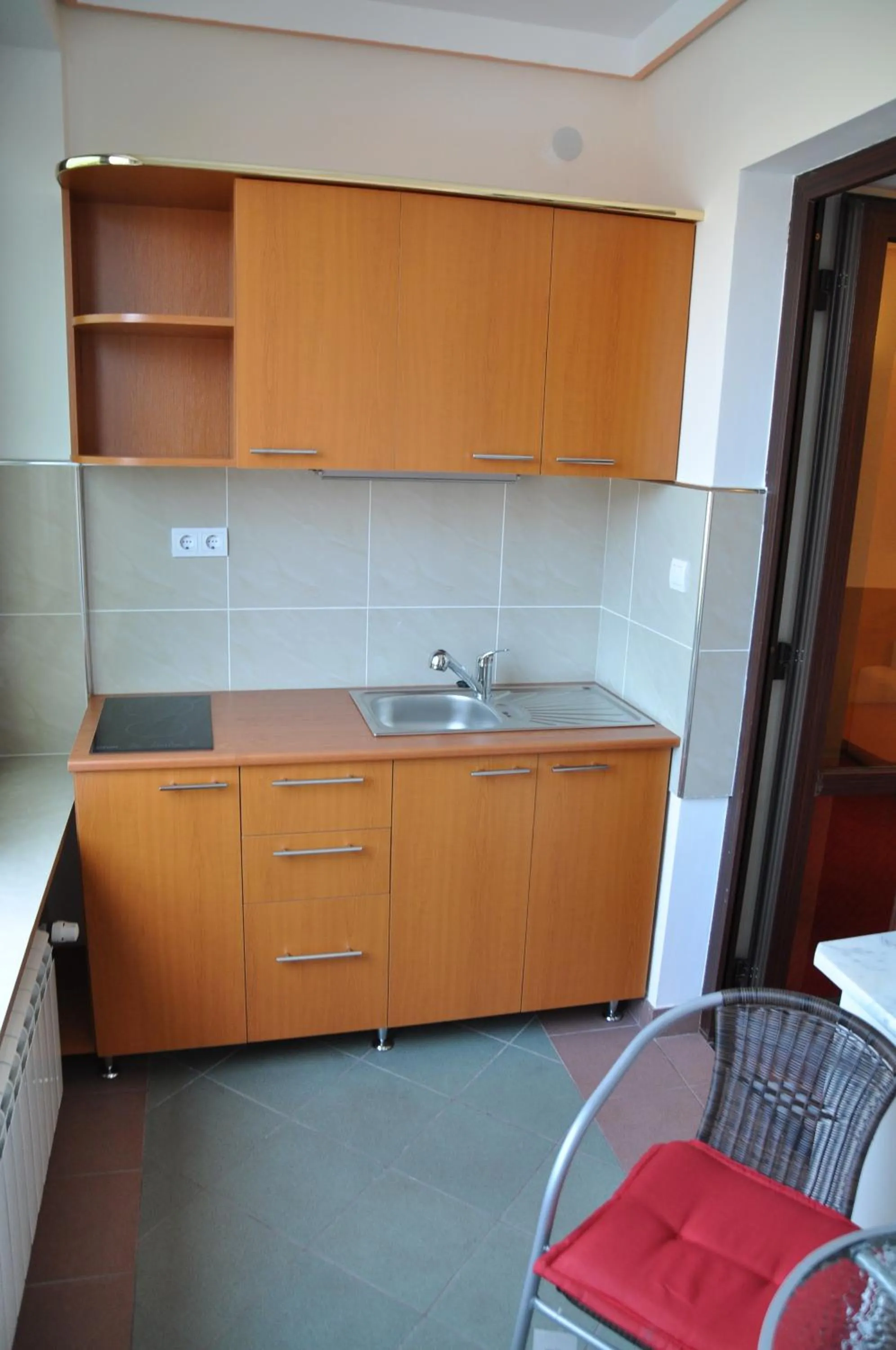 Kitchen or kitchenette in Pensiunea President