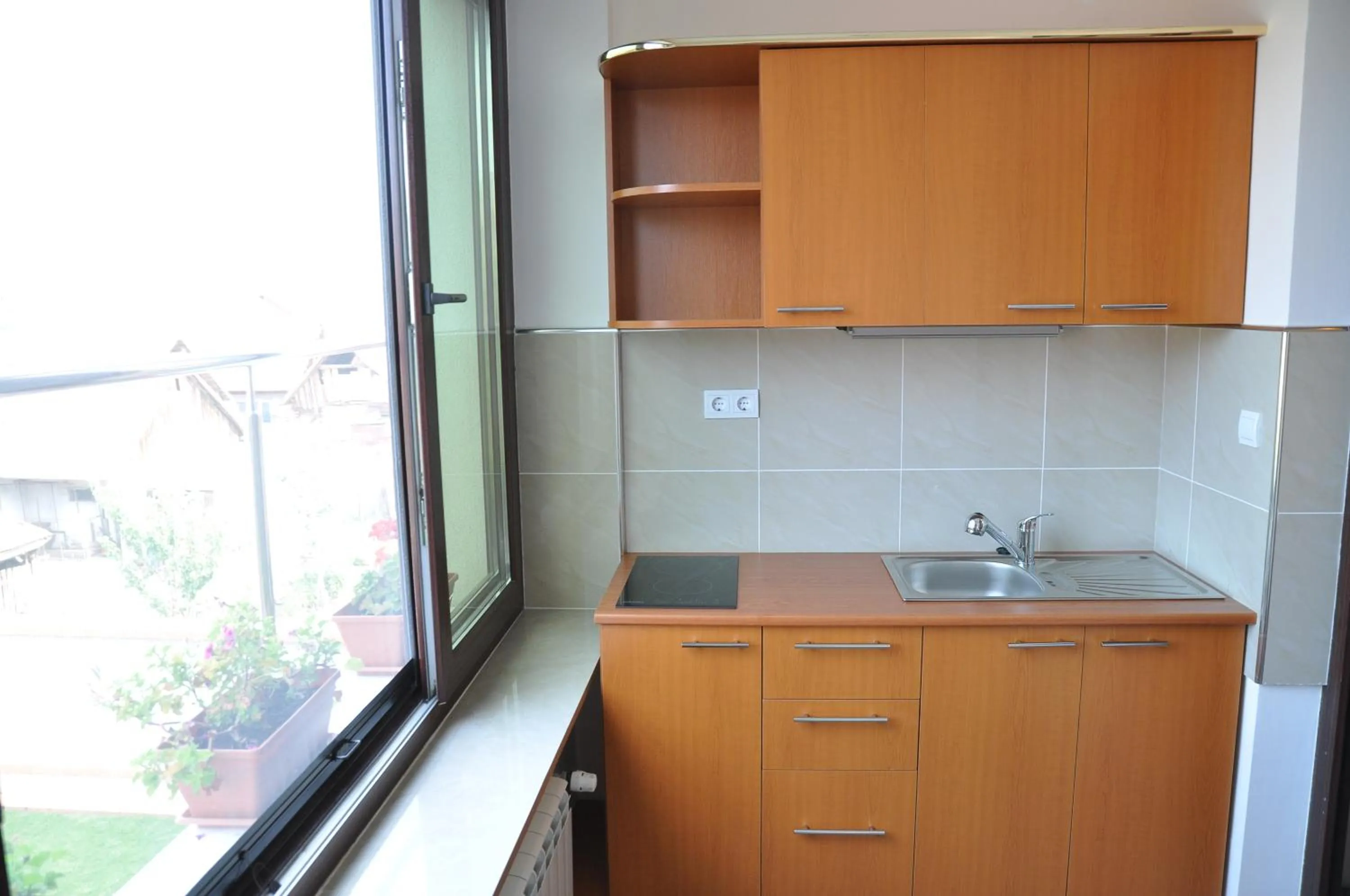 Kitchen or kitchenette in Pensiunea President