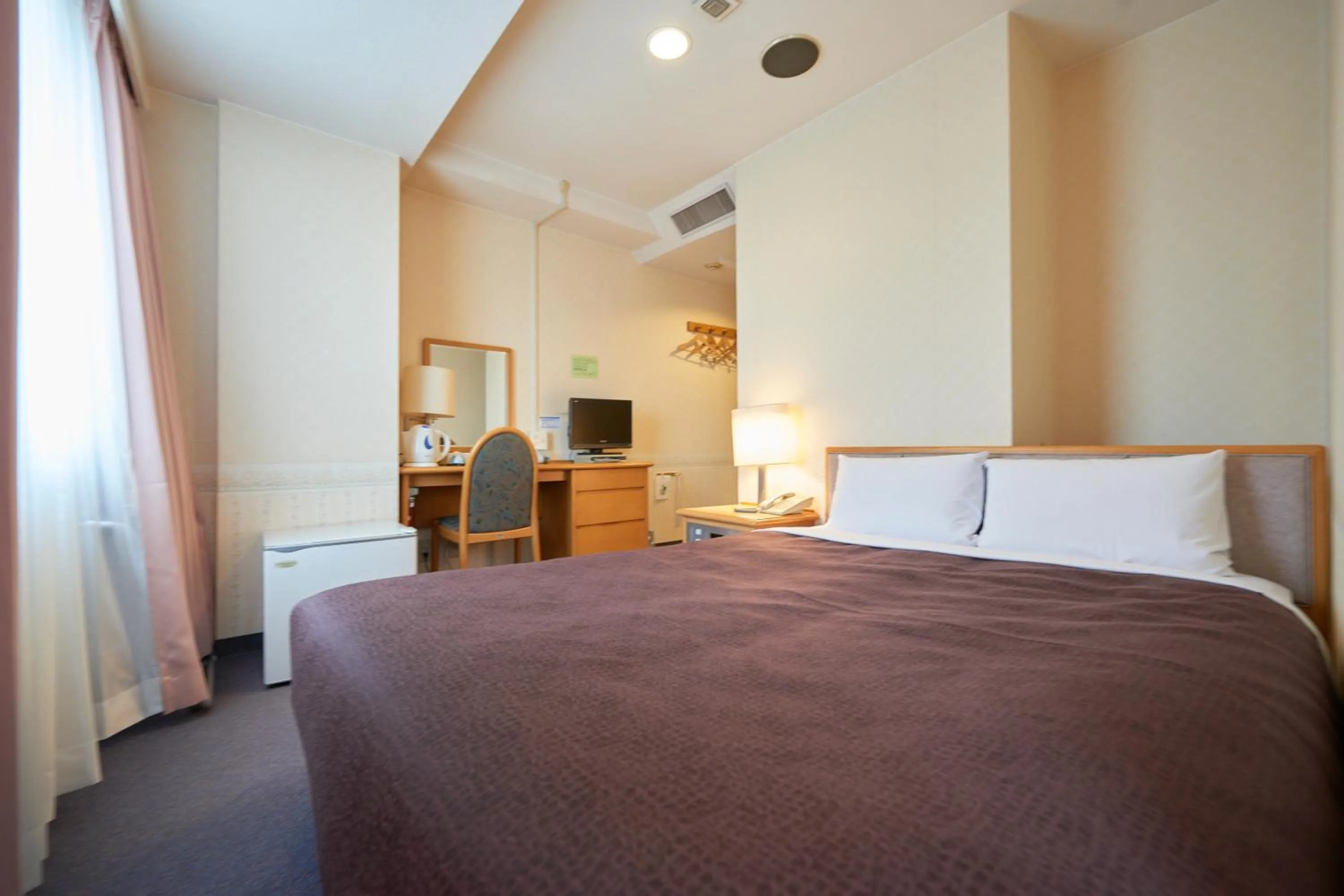 Bed in Hotel Select Inn Aomori