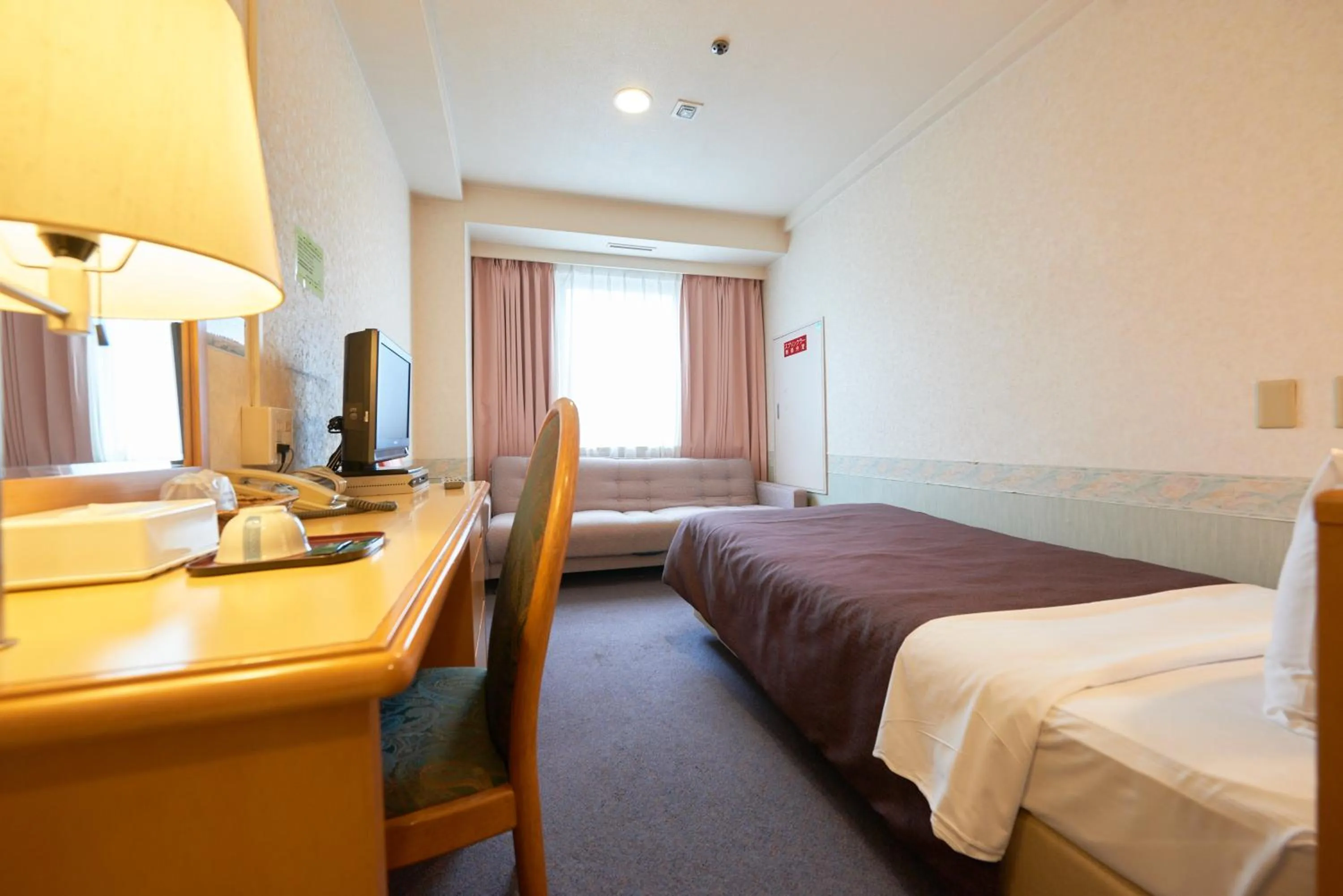 Bed in Hotel Select Inn Aomori