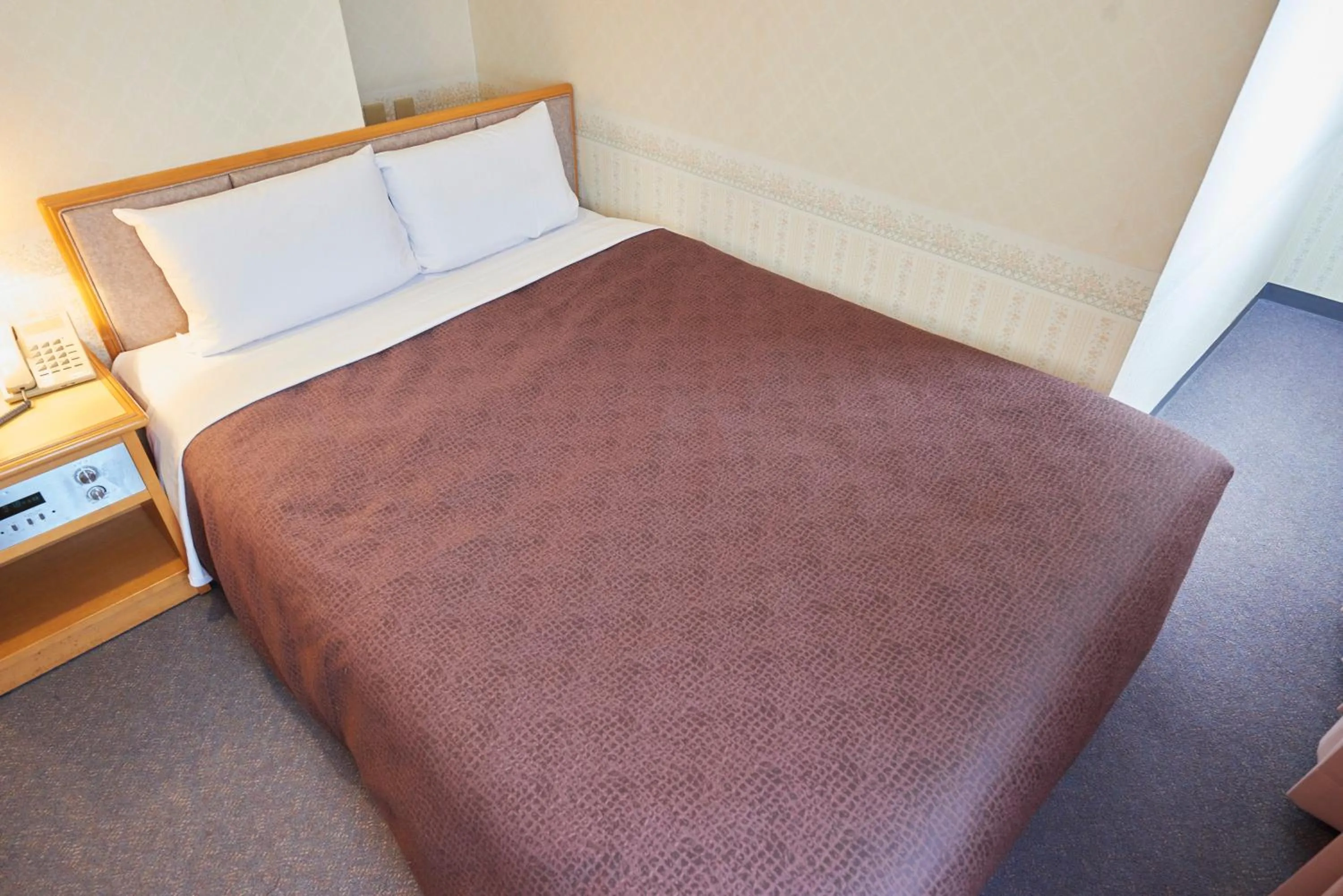 Bed in Hotel Select Inn Aomori