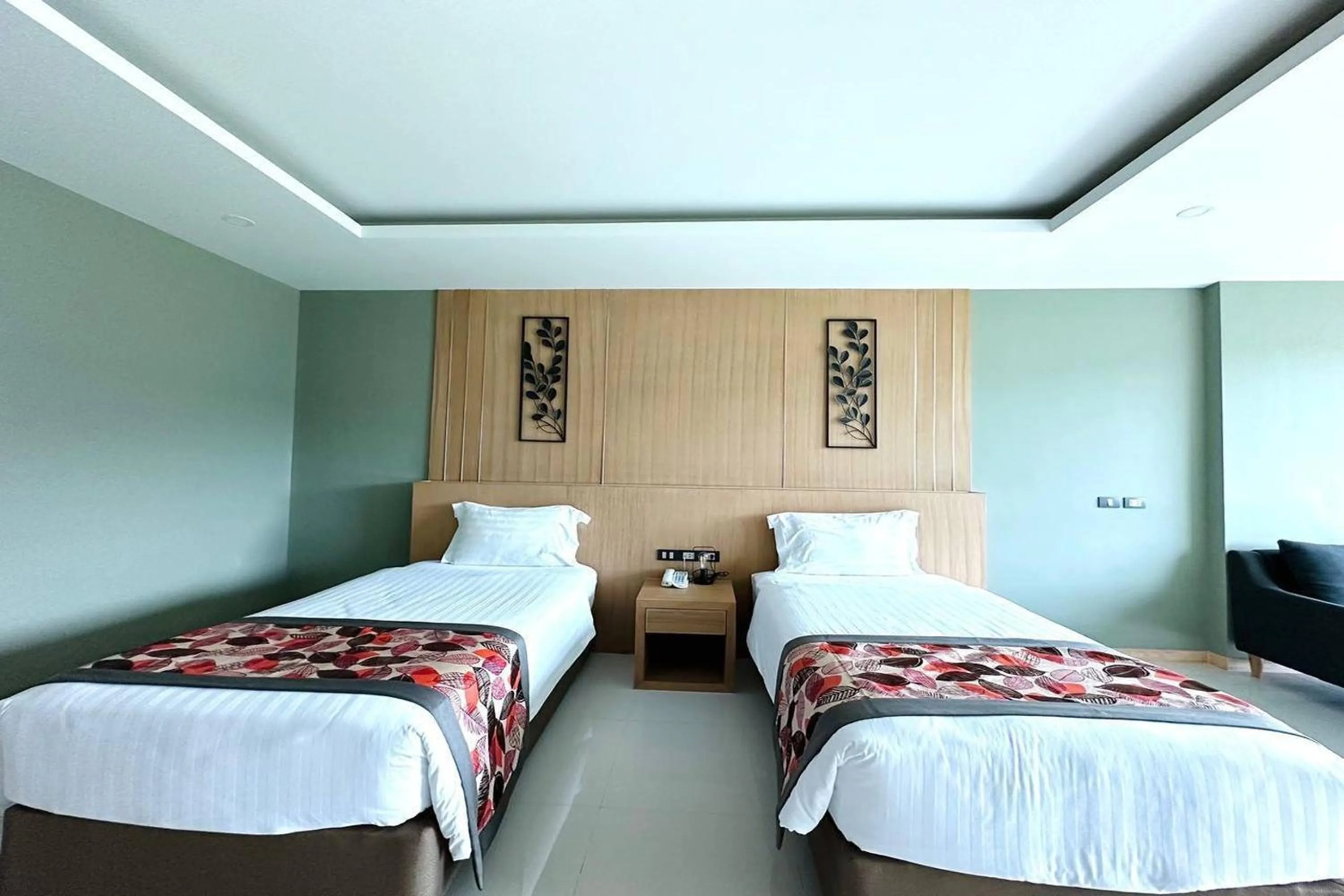 Bed in The Par Phuket SHA Plus