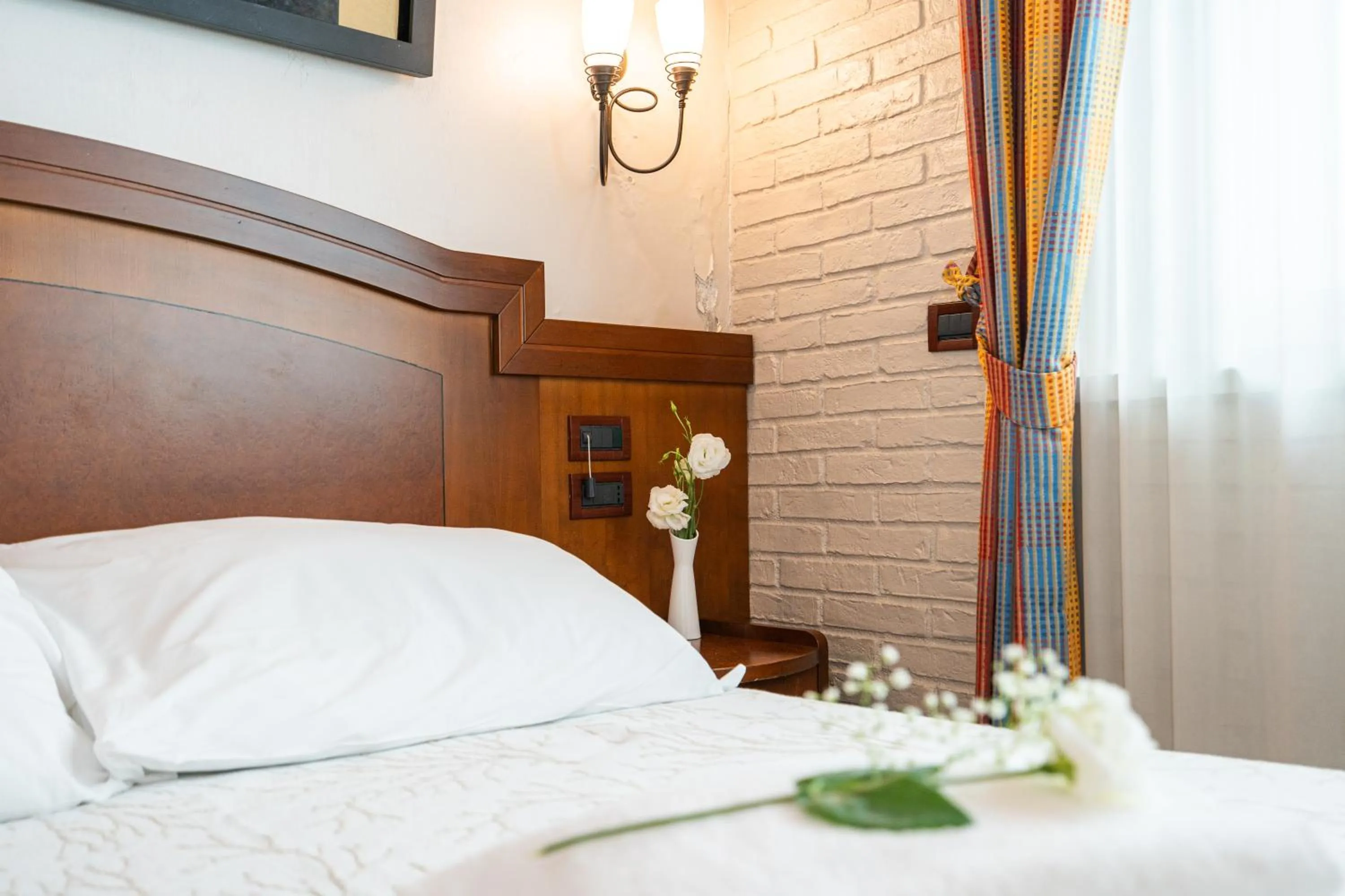 Bed in Art Hotel Santa Lucia