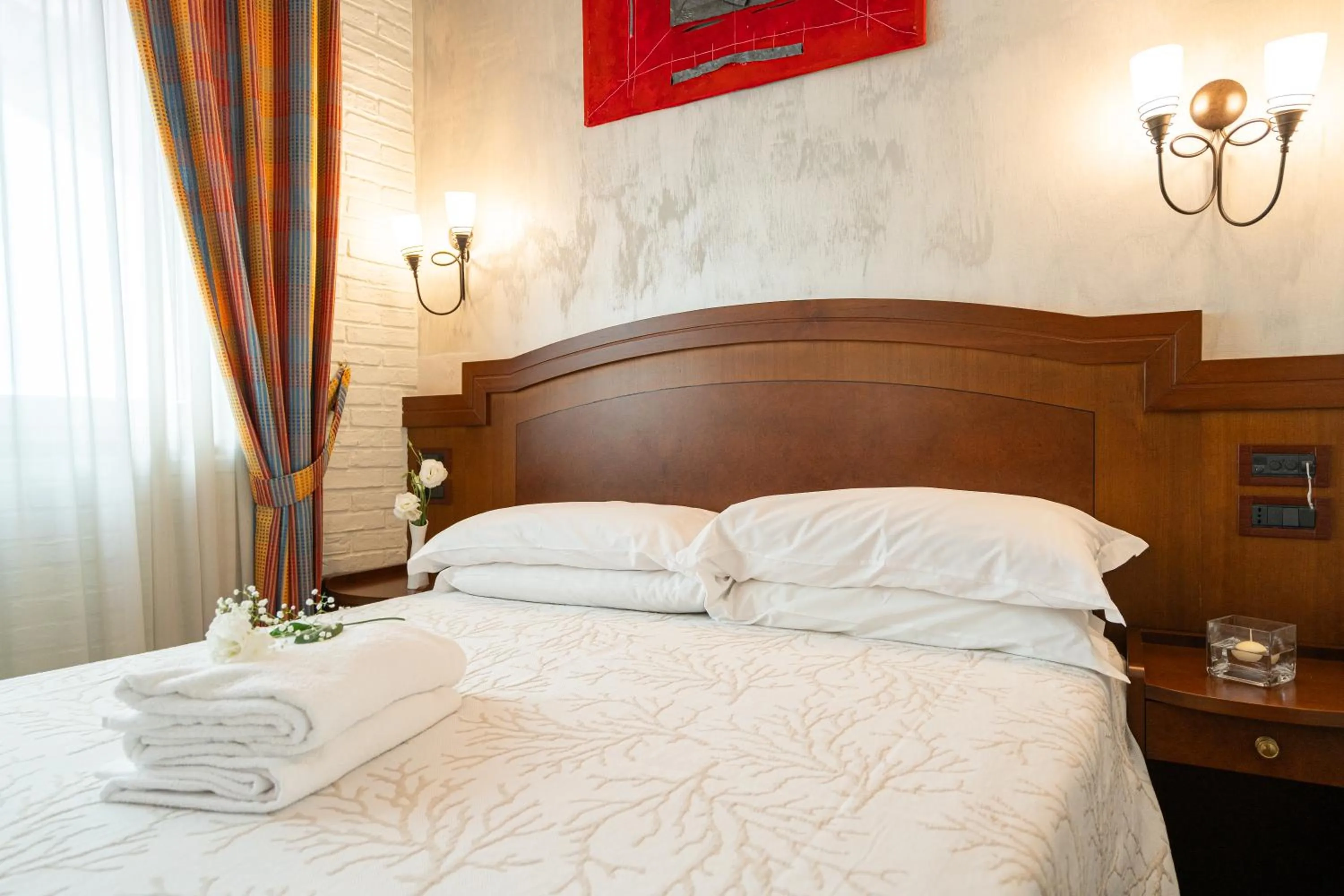 Bed in Art Hotel Santa Lucia