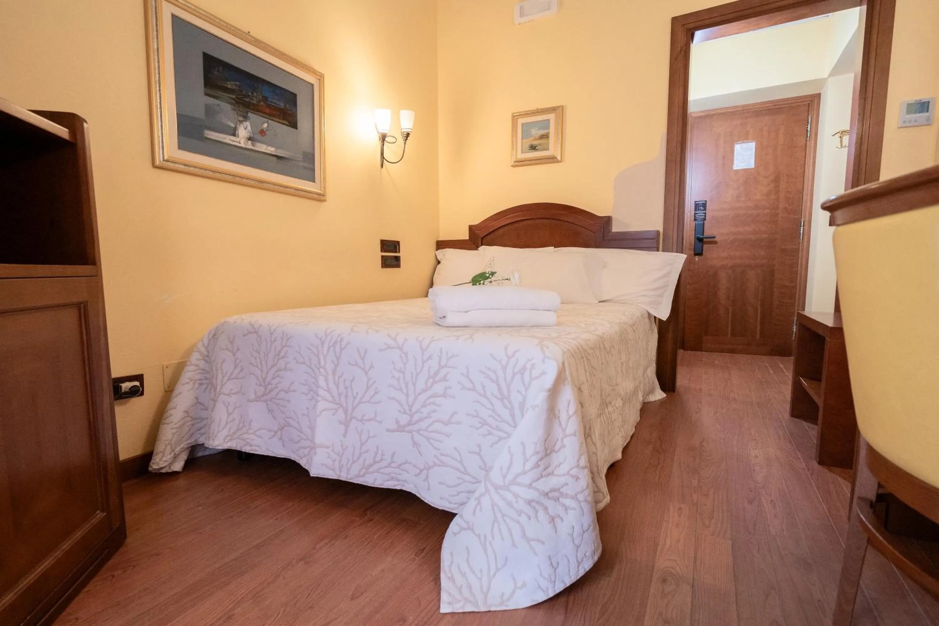 Bed in Art Hotel Santa Lucia