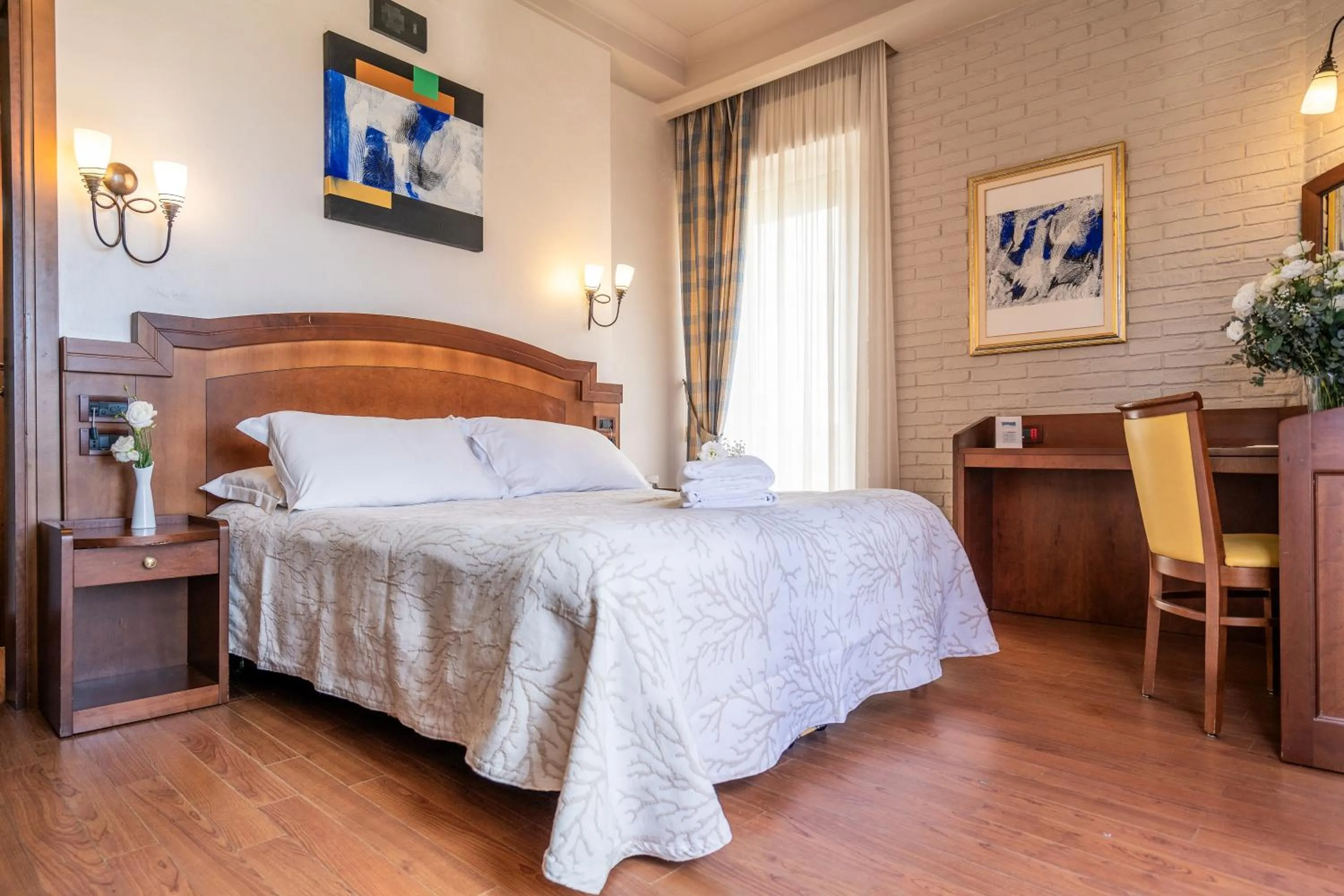 Bed in Art Hotel Santa Lucia