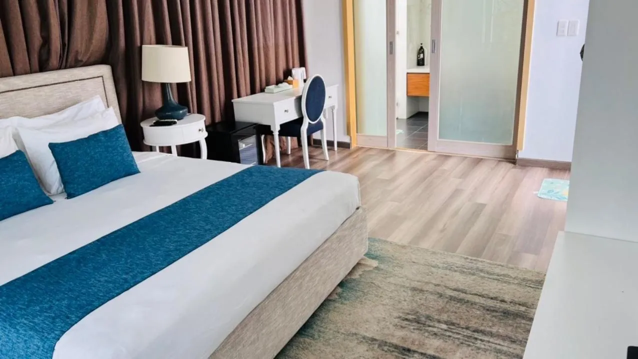 Bed in Villas at Oceanami Resort