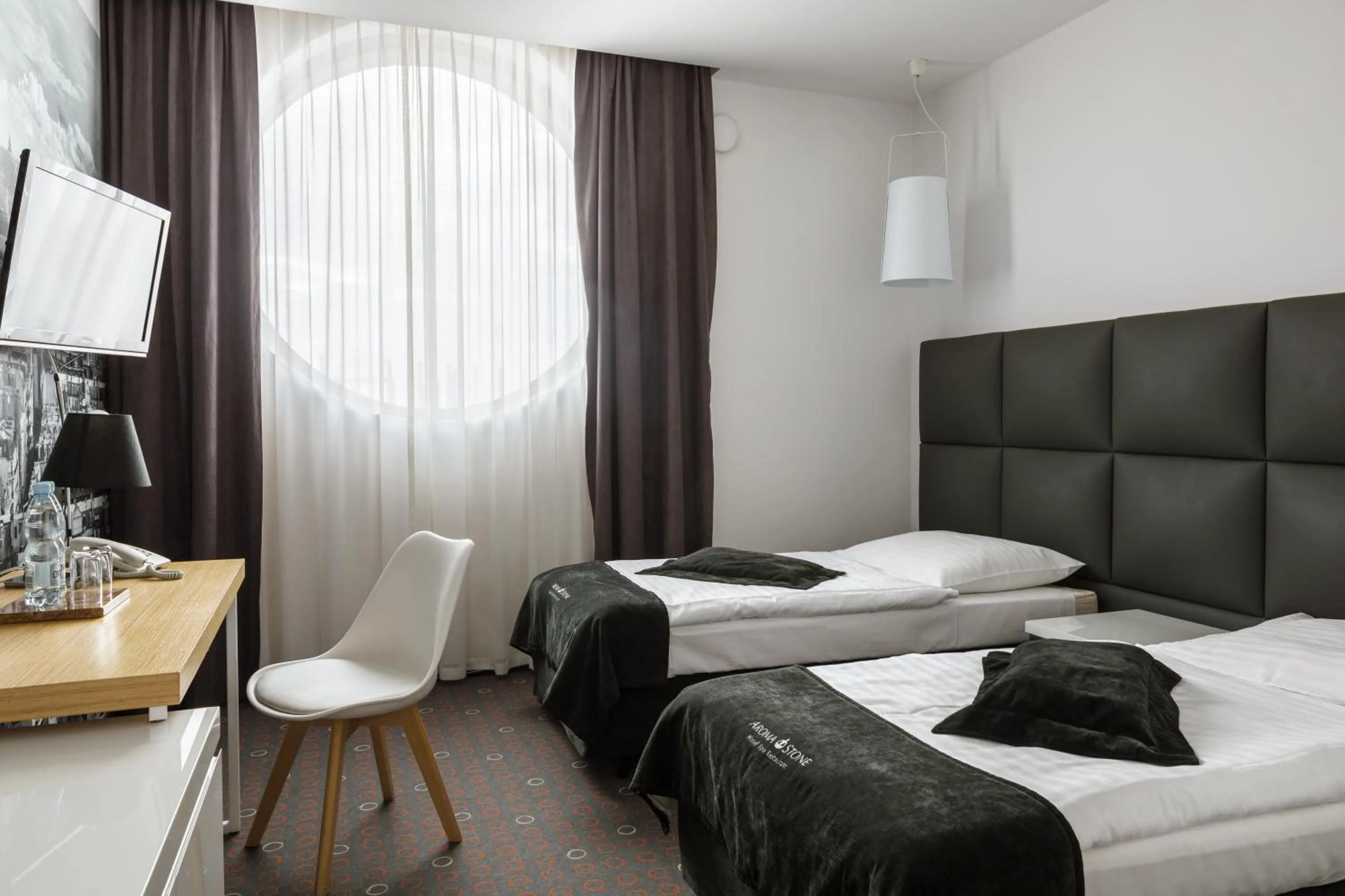 Bed in Aroma Stone Hotel Spa