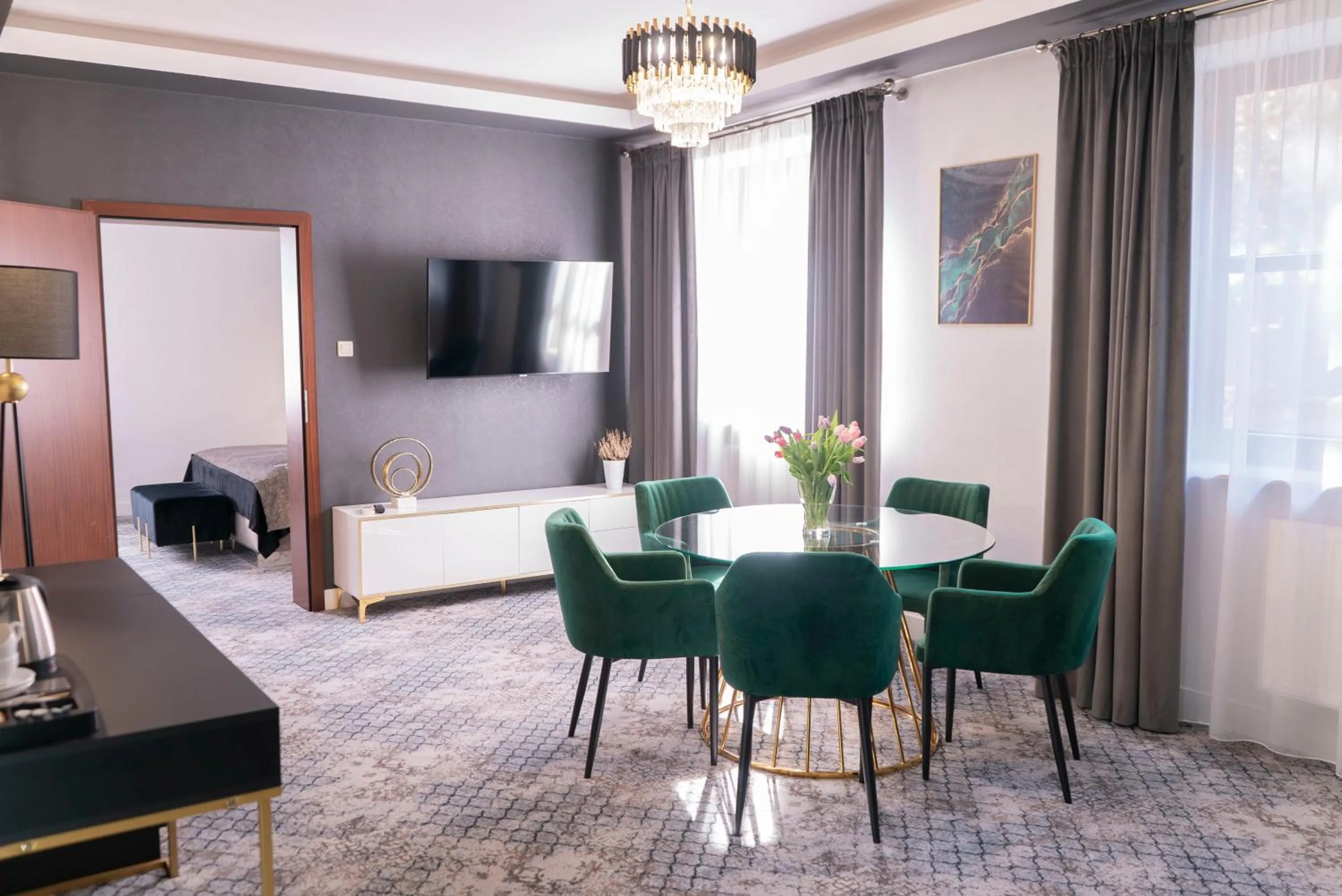 Communal lounge/ TV room in Hotel Korona Spa & Wellness
