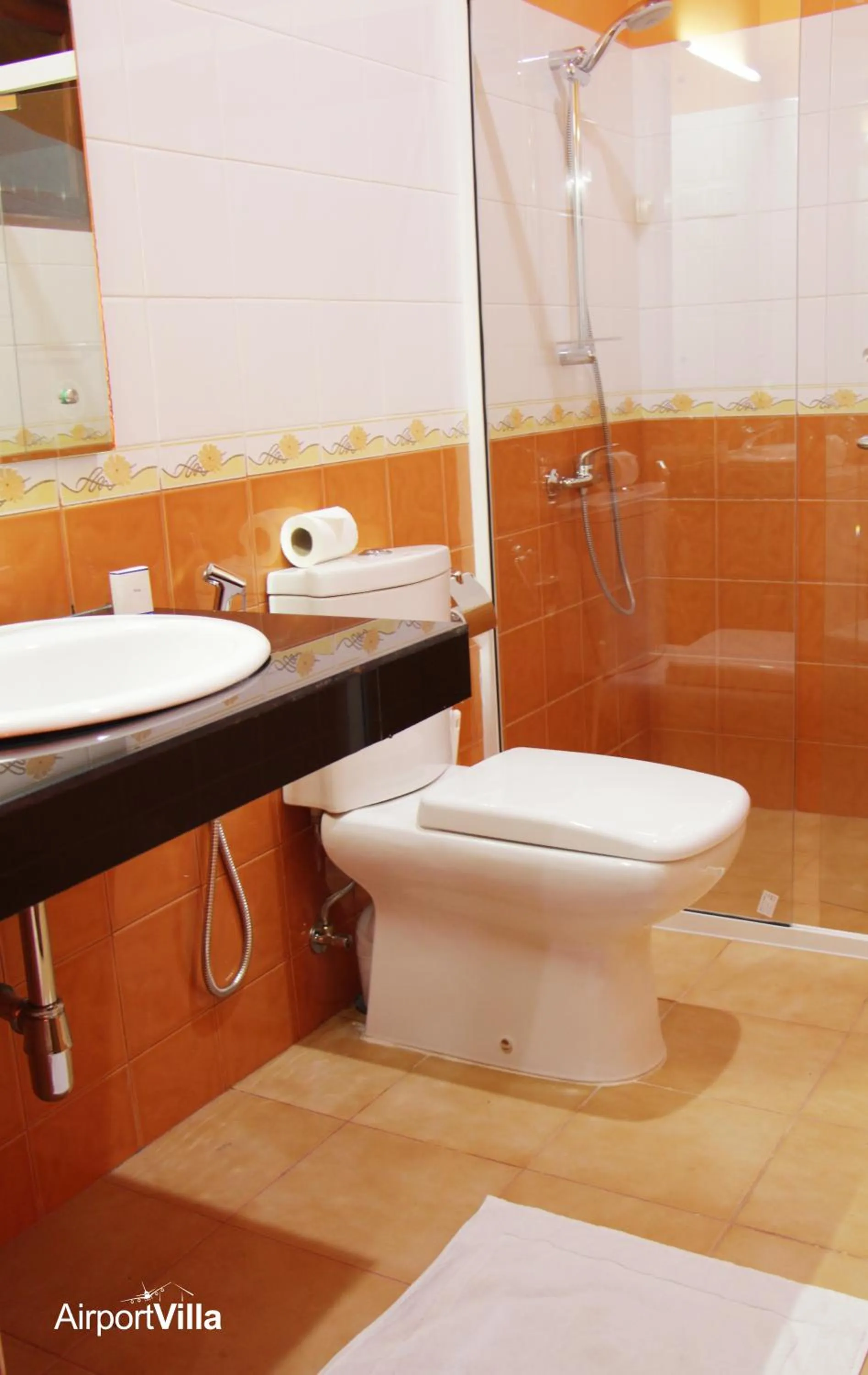 Shower in Airport Villa
