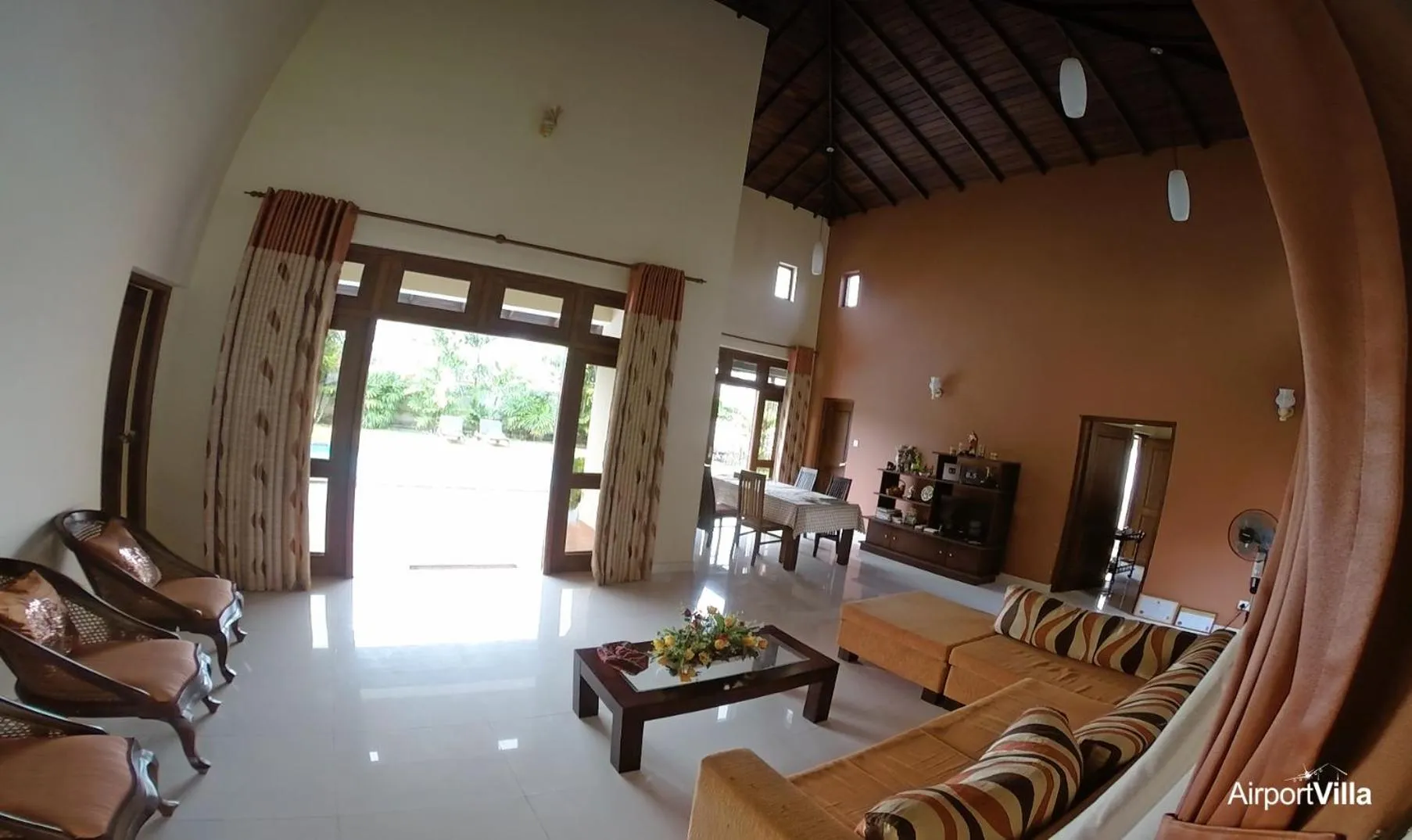 Communal lounge/ TV room in Airport Villa