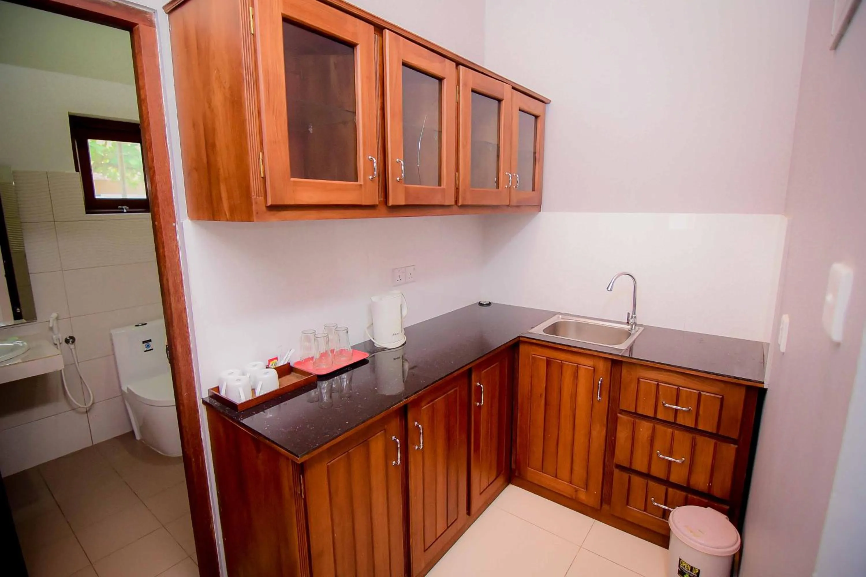Kitchen or kitchenette in Airport Villa