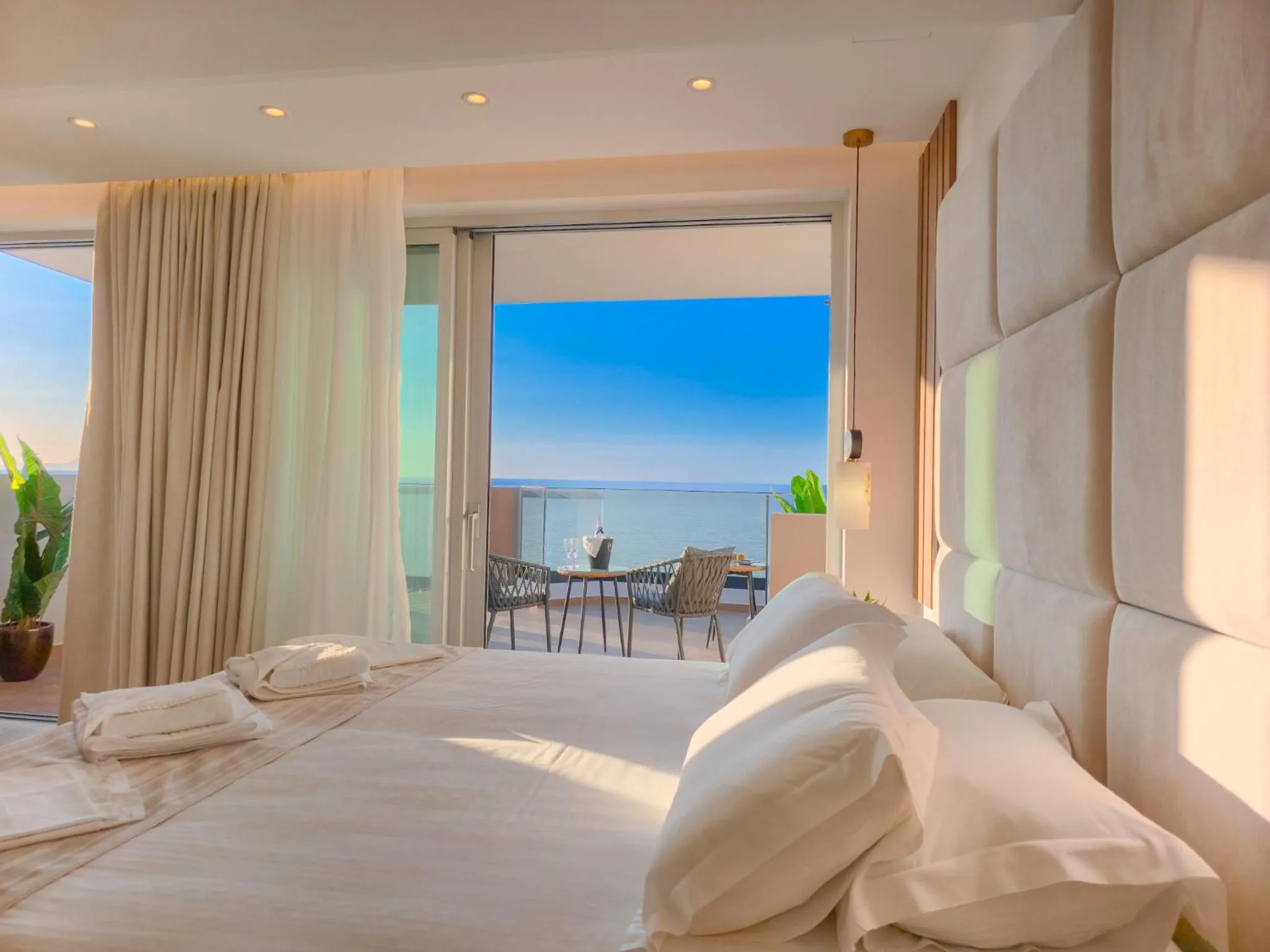 Bed in Theo Beach Hotel Apartments