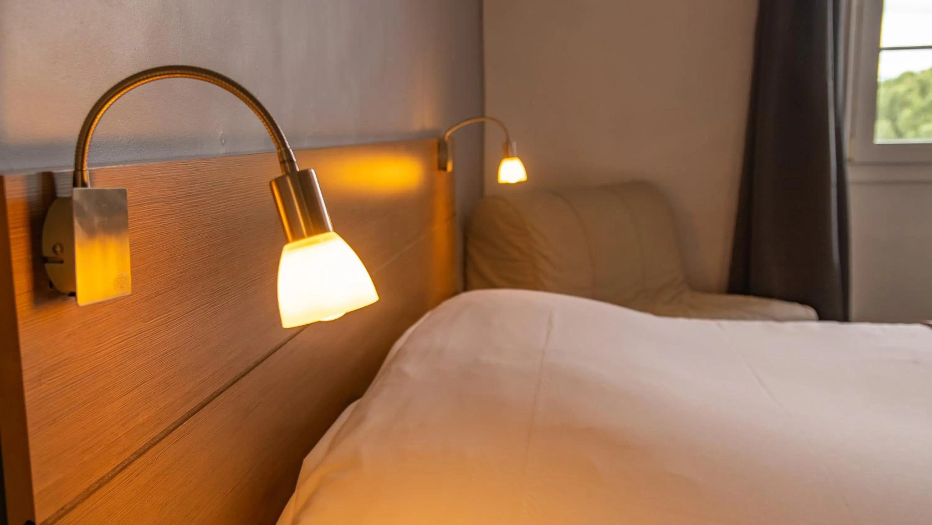 Bed in Logis Hotels - Au Colombier du Touron