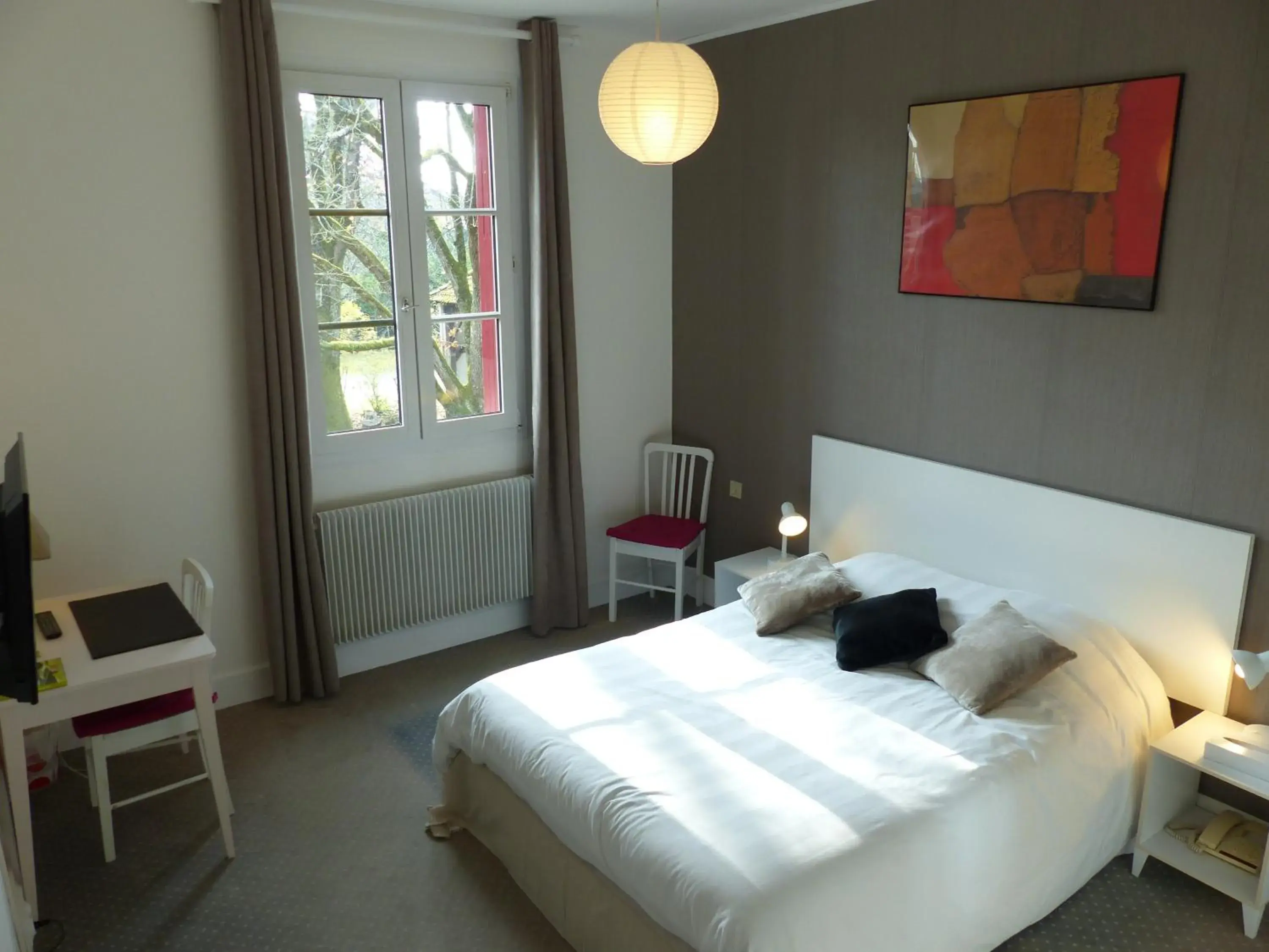 Bedroom, Bed in Logis Hotels - Au Colombier du Touron Bedroom, Bed in Logis Hotels - Au Colombier du Touron