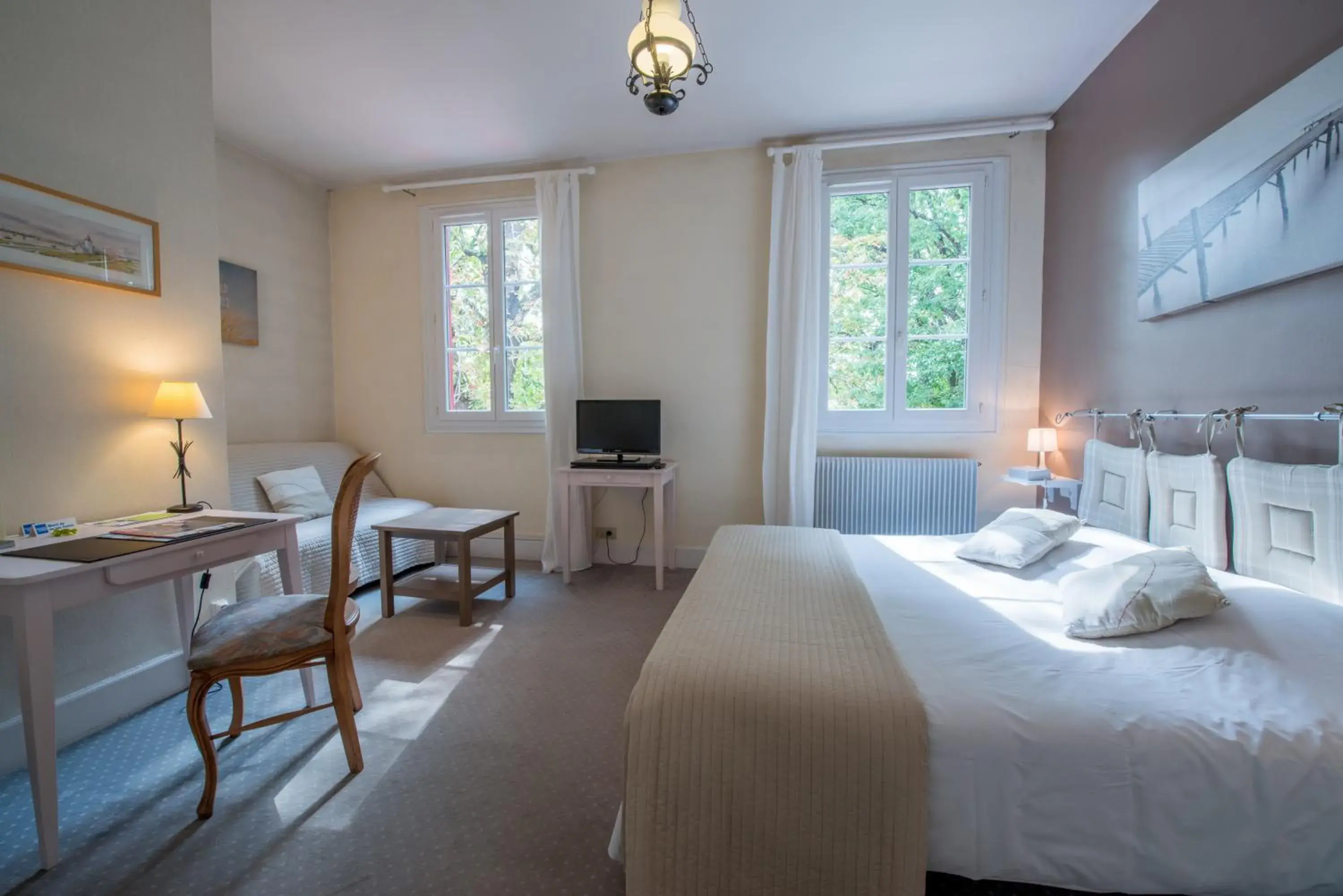 Bed in Logis Hotels - Au Colombier du Touron Bed in Logis Hotels - Au Colombier du Touron