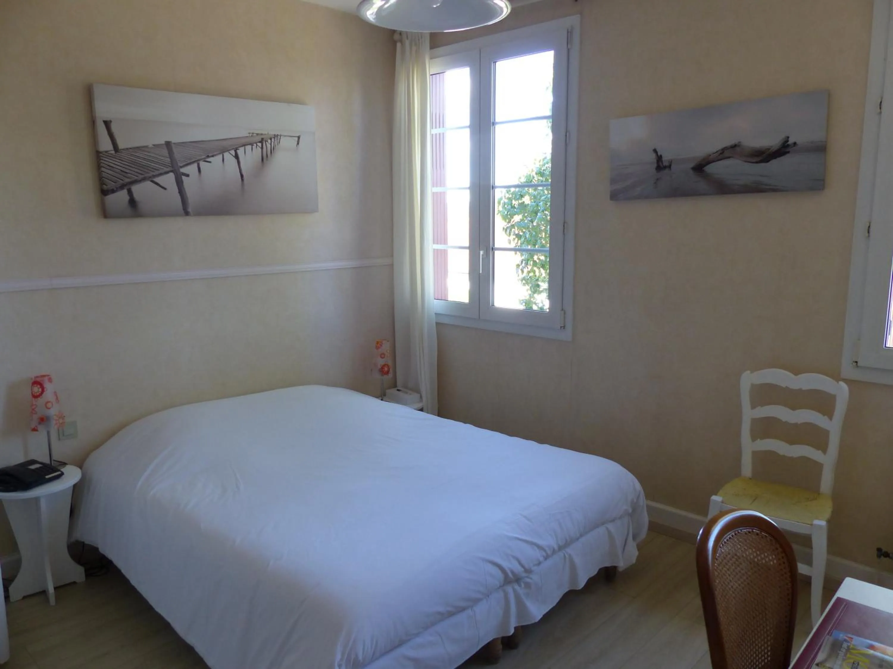 Bedroom, Bed in Logis Hotels - Au Colombier du Touron