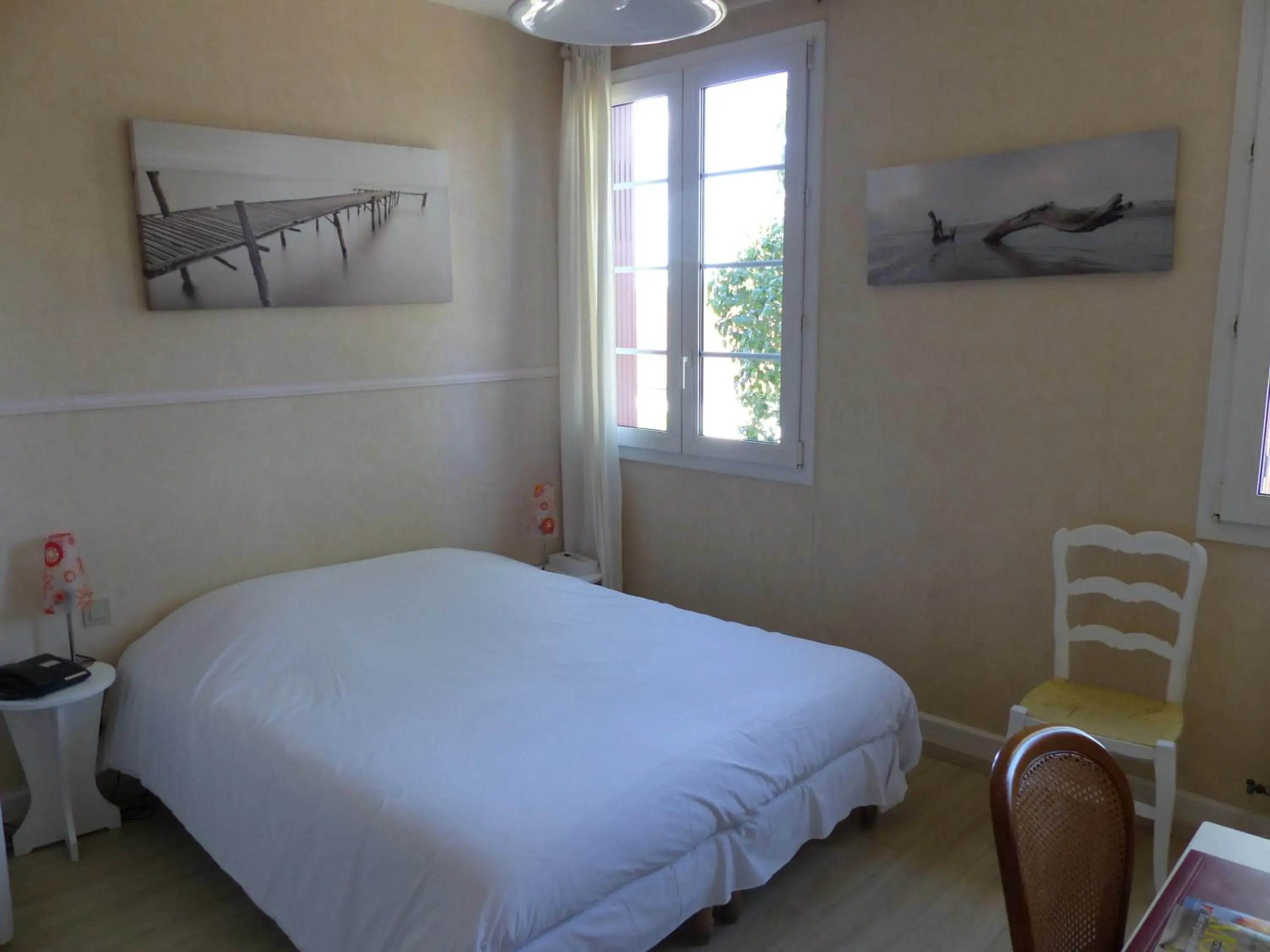 Bedroom, Bed in Logis Hotels - Au Colombier du Touron Bedroom, Bed in Logis Hotels - Au Colombier du Touron