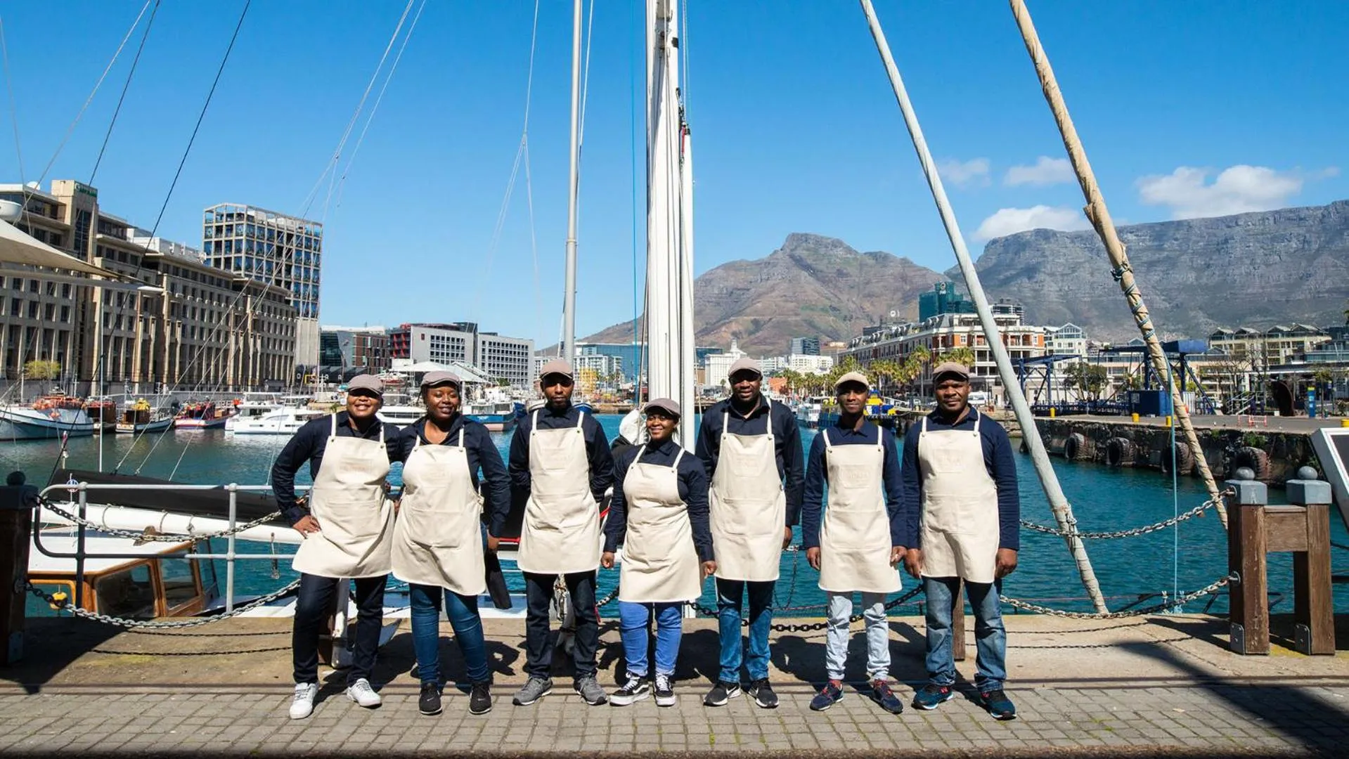 People in Victoria & Alfred Hotel by NEWMARK