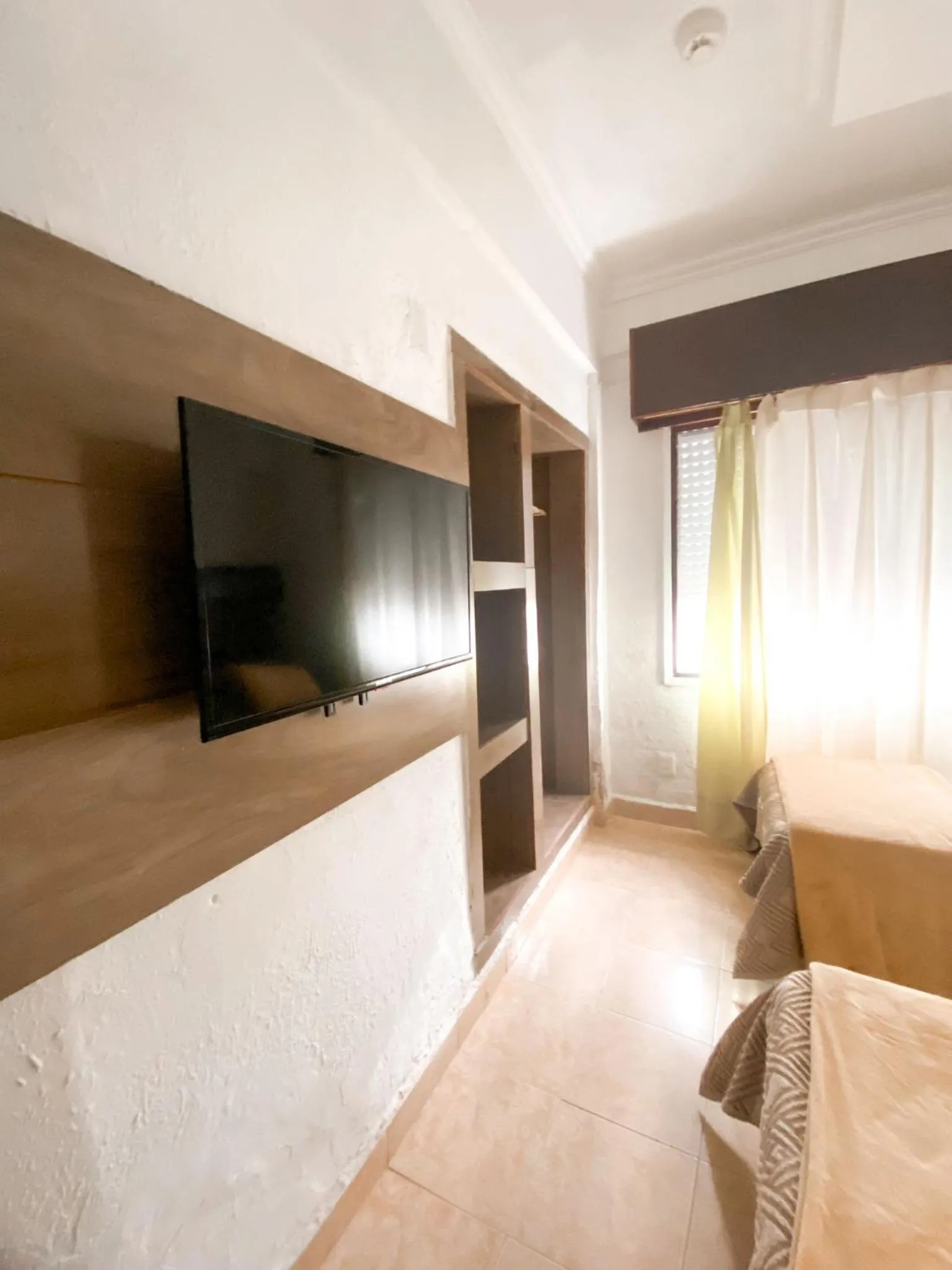 TV and multimedia, Bed in Hotel Lujan