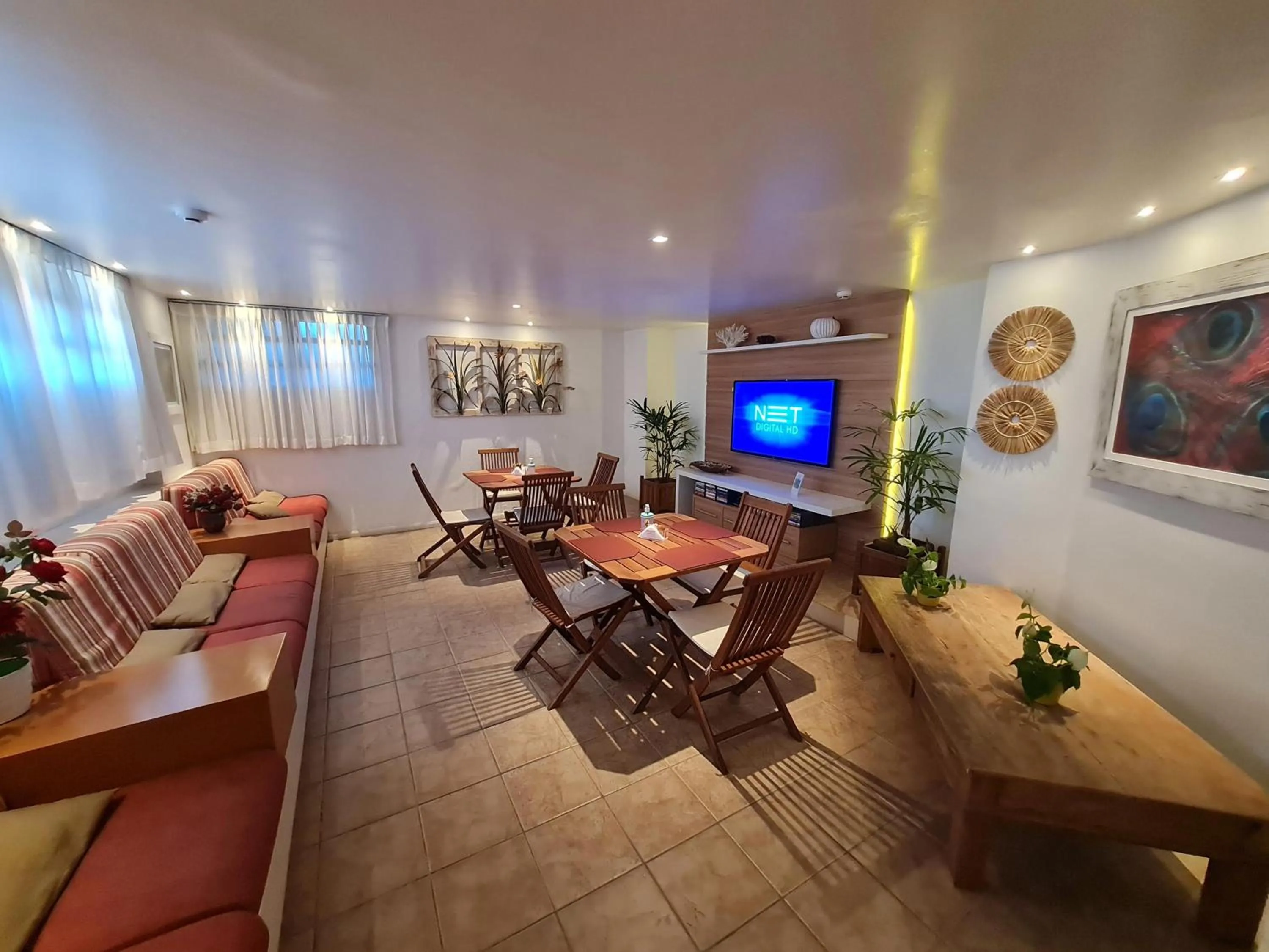 Communal lounge/ TV room in Belle Arti Pousada