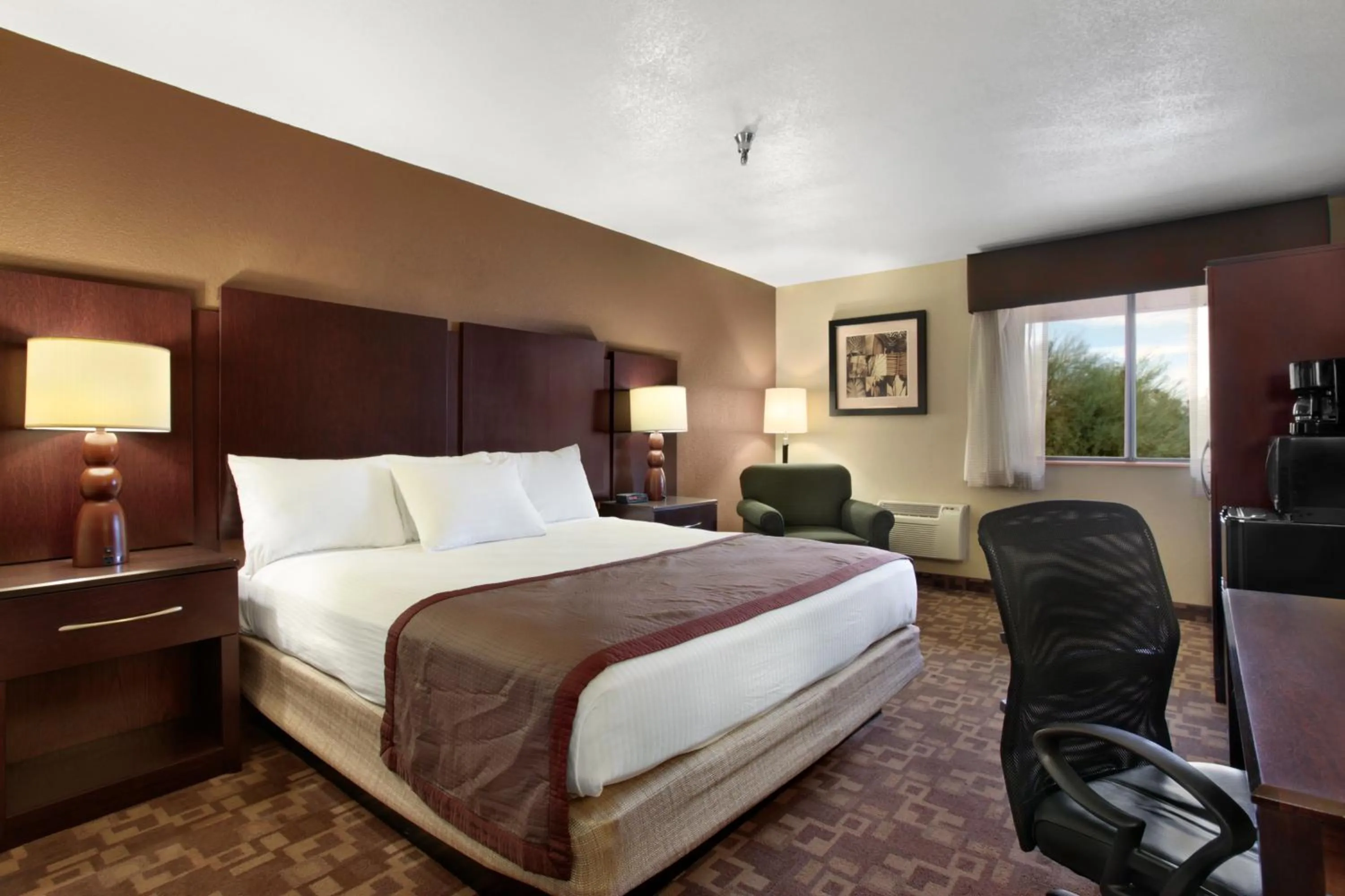 Photo of the whole room, Bed in Super 8 by Wyndham Chandler Phoenix
