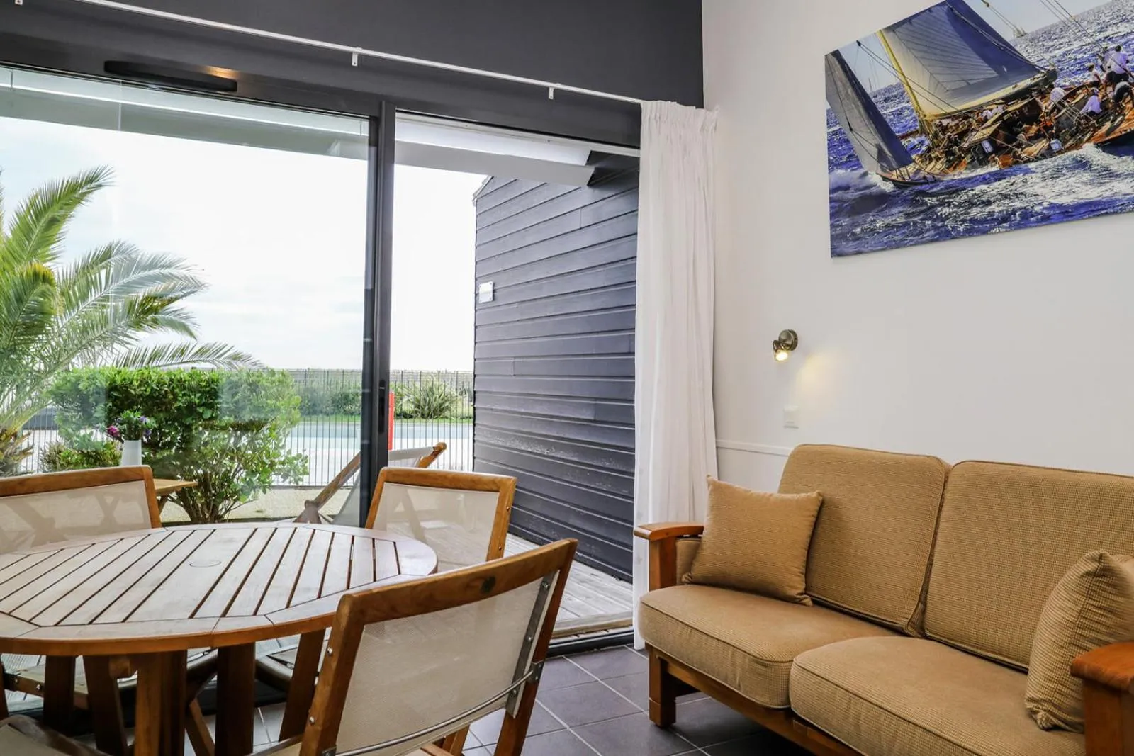 Seating area in Hôtel Les Vignes de la Chapelle, "The Originals Relais"