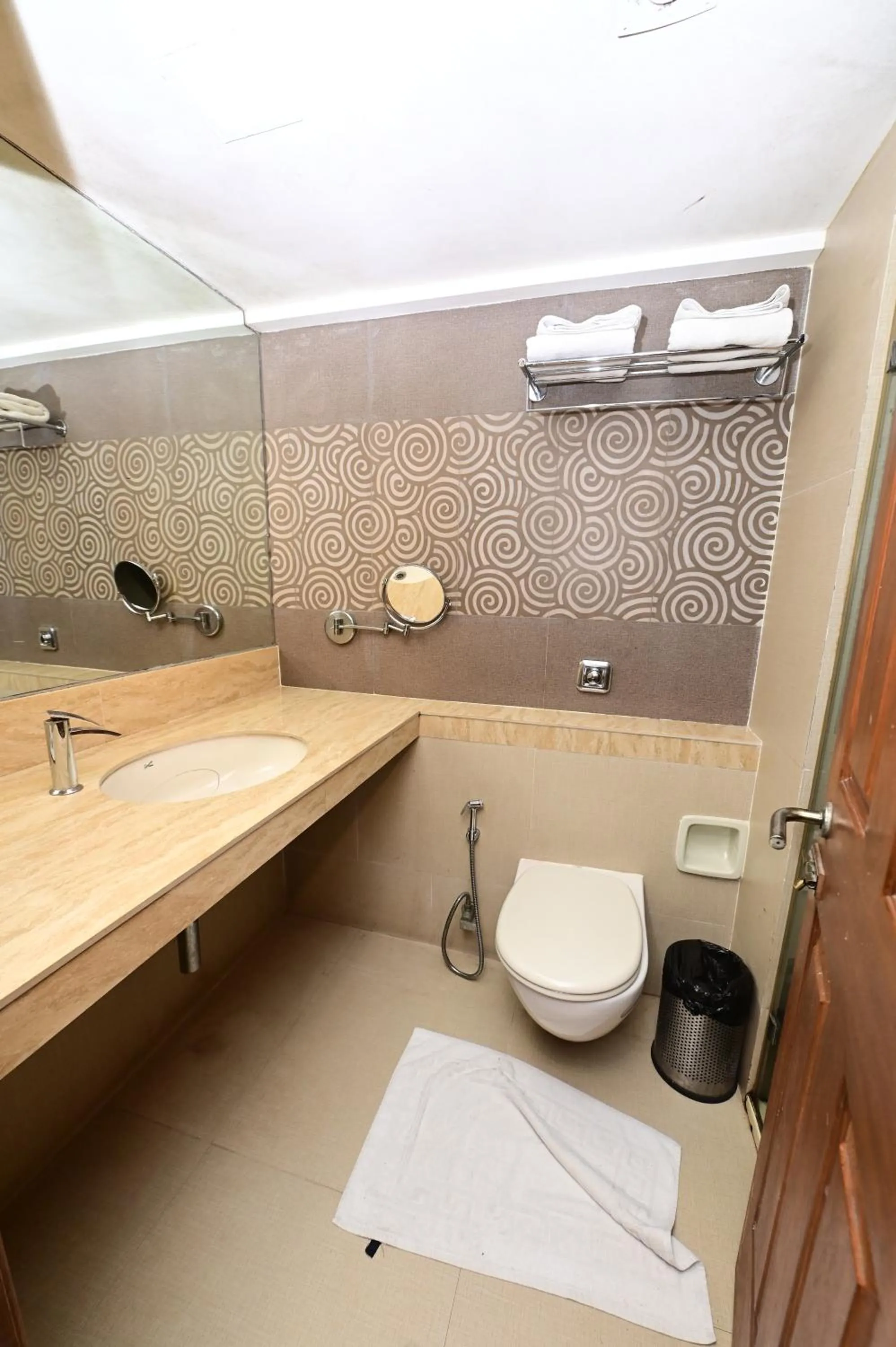 Toilet in Hotel Sai Inn