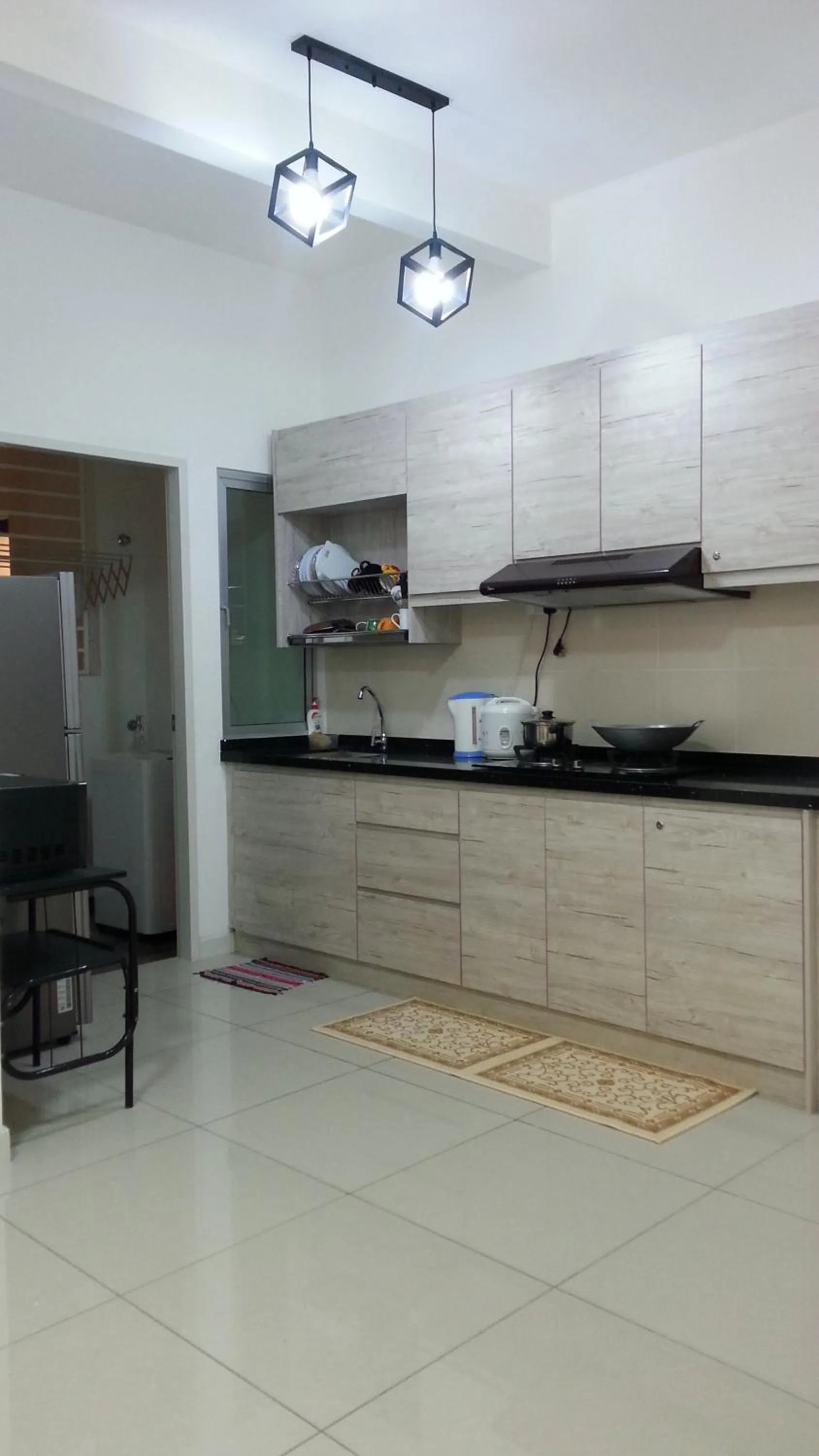 Kitchen or kitchenette in AZ Homestay @ Southville City